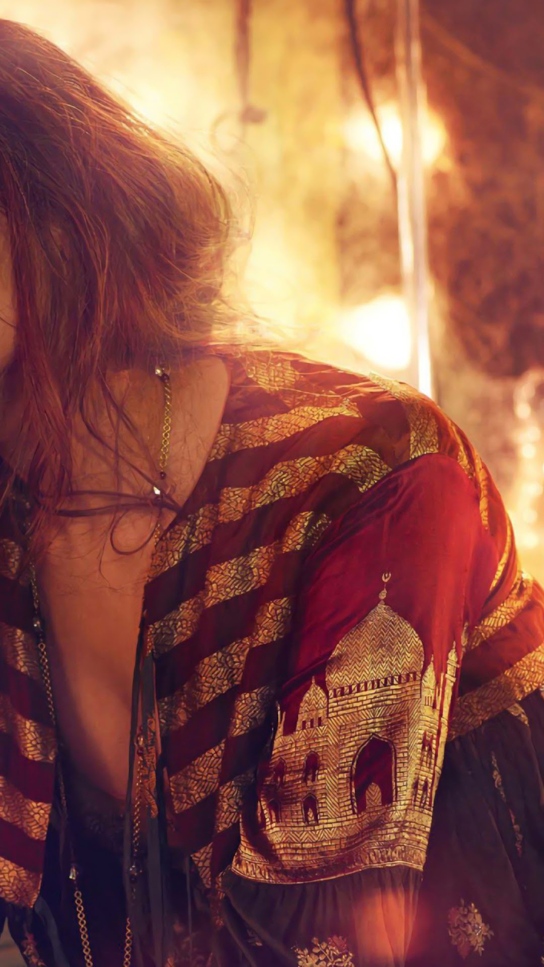 Deepika Padukone in a red and gold outfit HD Phone Wallpaper
