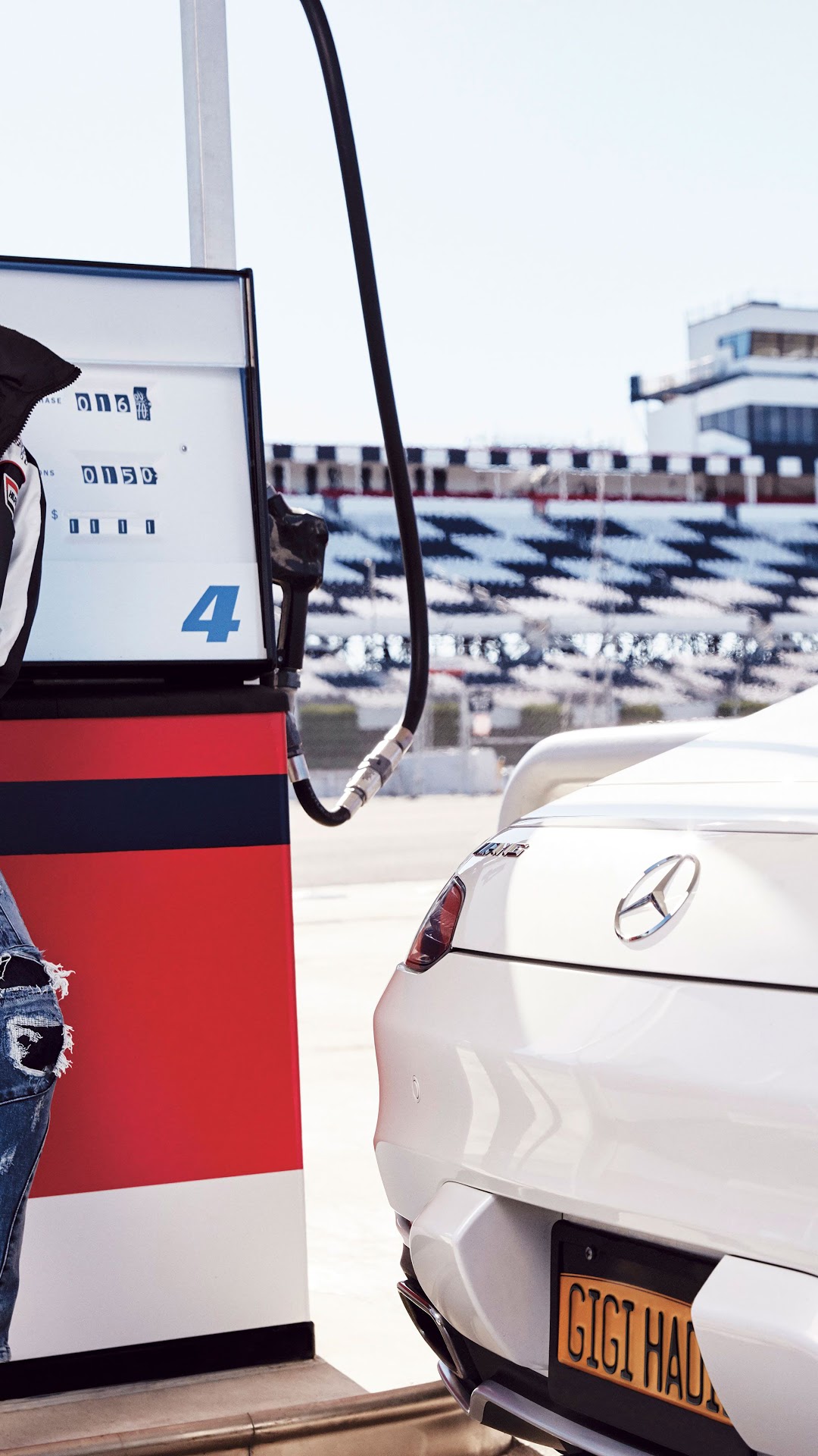 Gigi Hadid at a Gas Station with Mercedes-Benz HD Phone Wallpaper