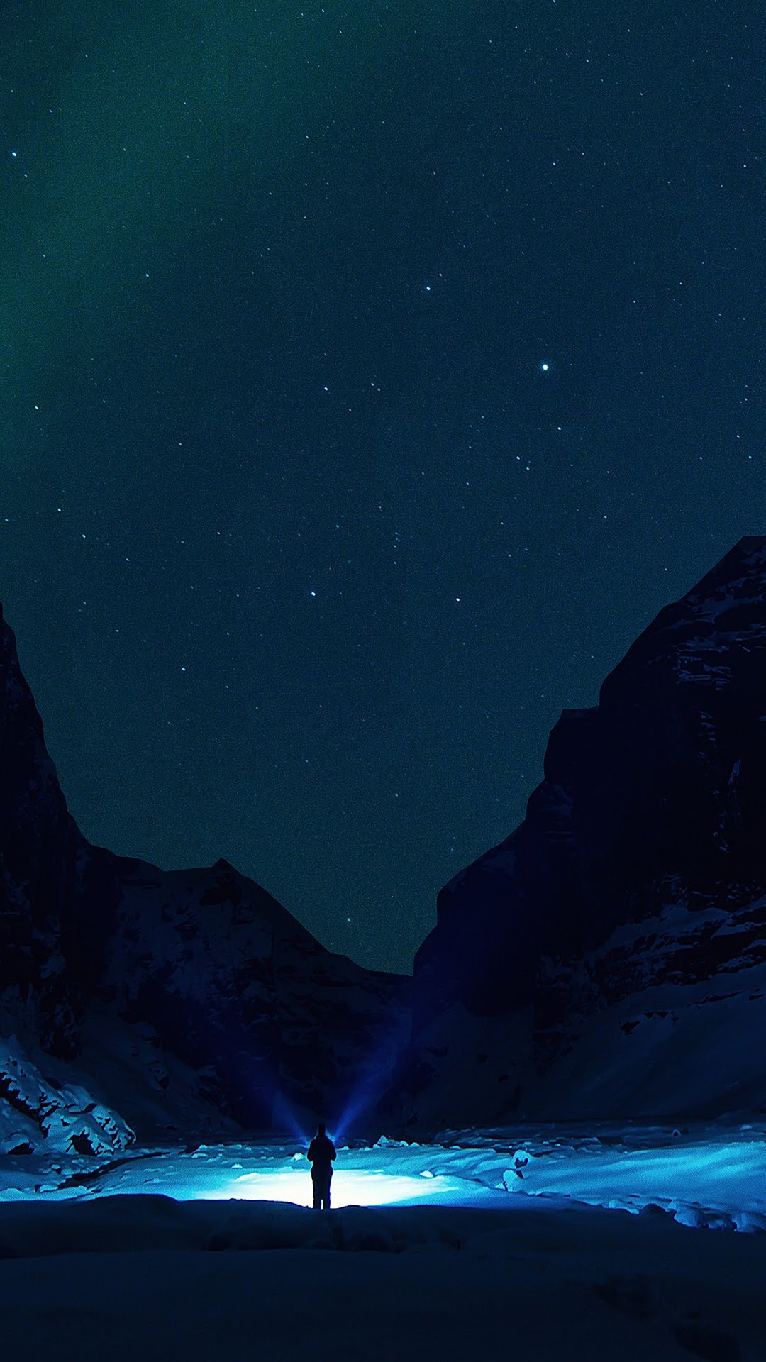Person with flashlight under starry sky and aurora HD Phone Wallpaper