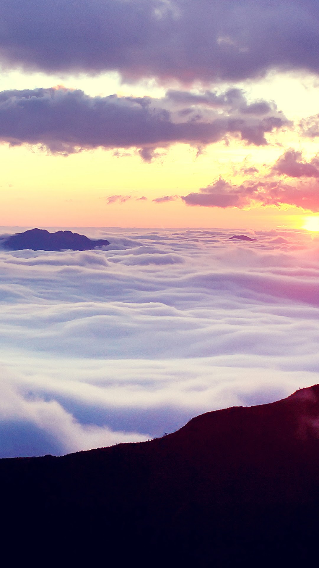 Sunrise over clouds with mountains HD Phone Wallpaper