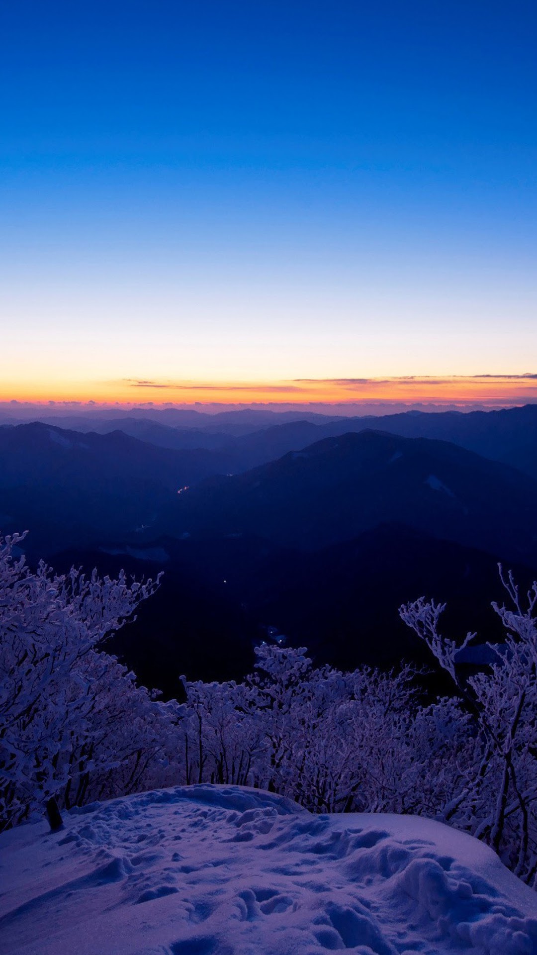 Snowy mountain landscape at dawn with frosted trees HD Phone Wallpaper