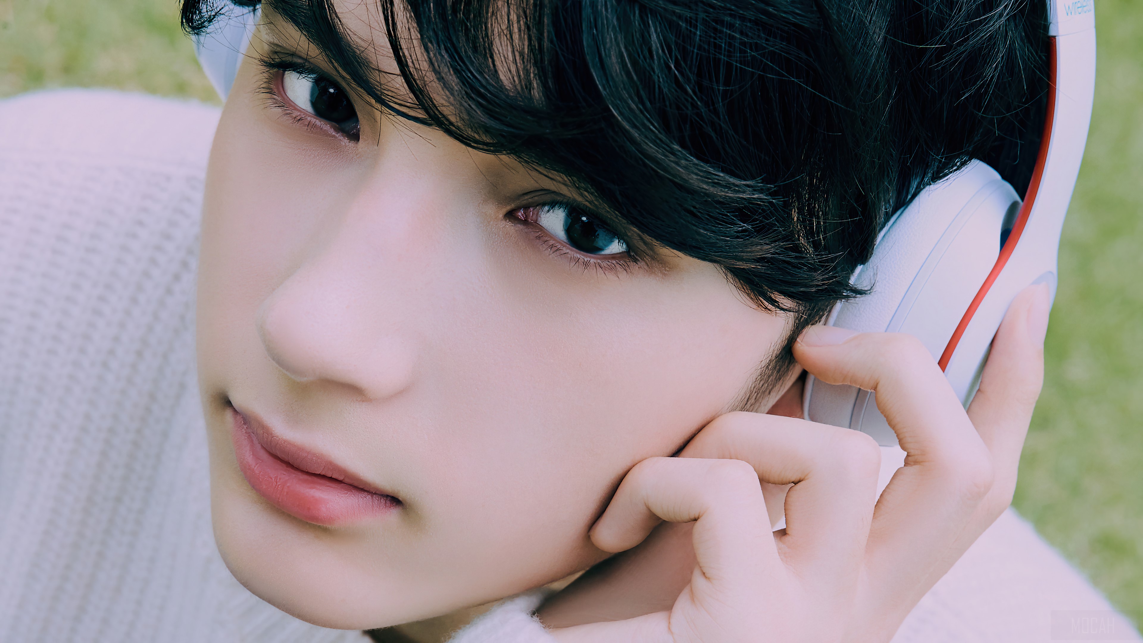 Huening Kai from TXT Close-Up with Headphones 4K HD Wallpaper