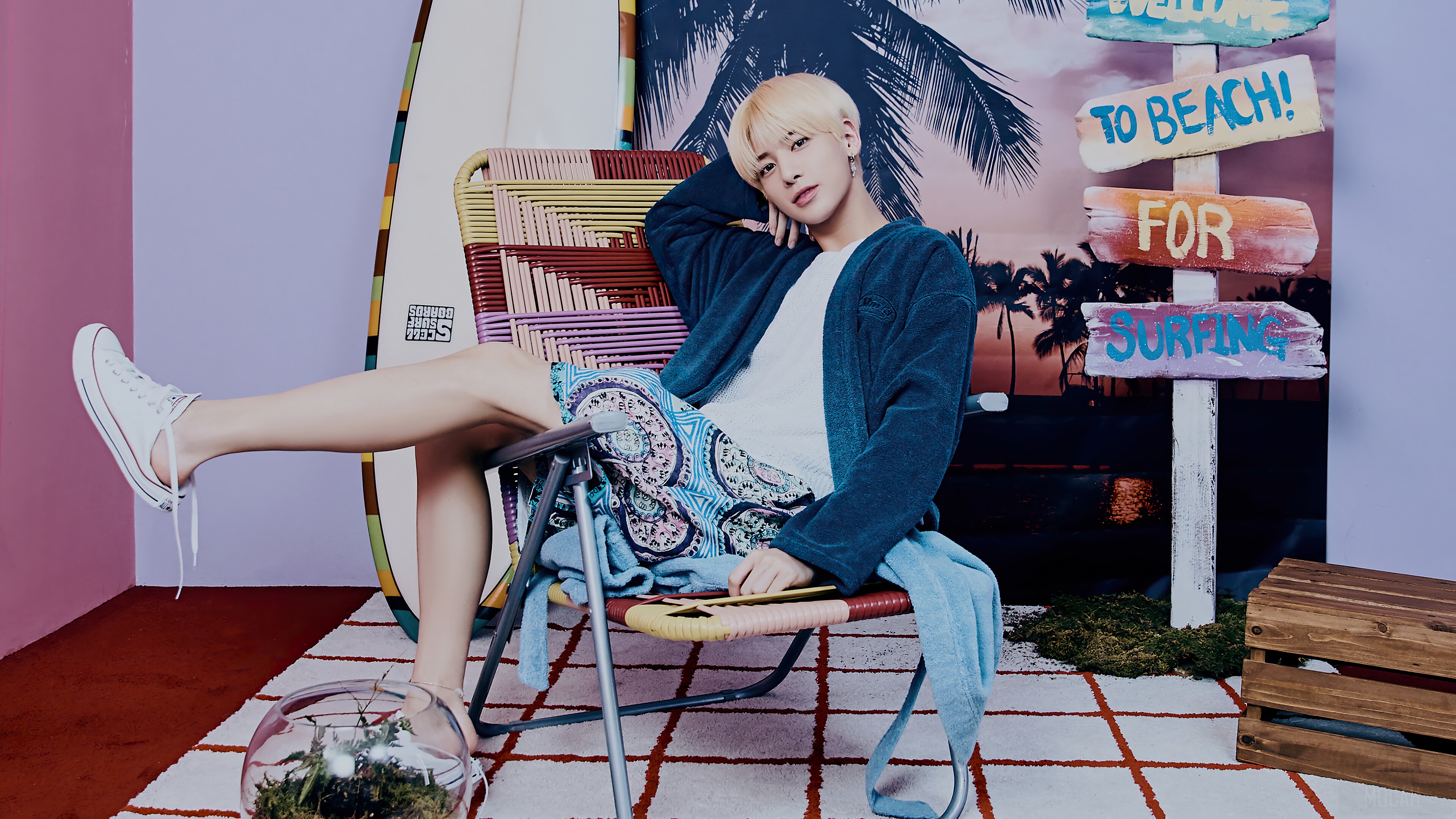 Taehyun from TXT posing in a beach-themed photoshoot HD Wallpaper