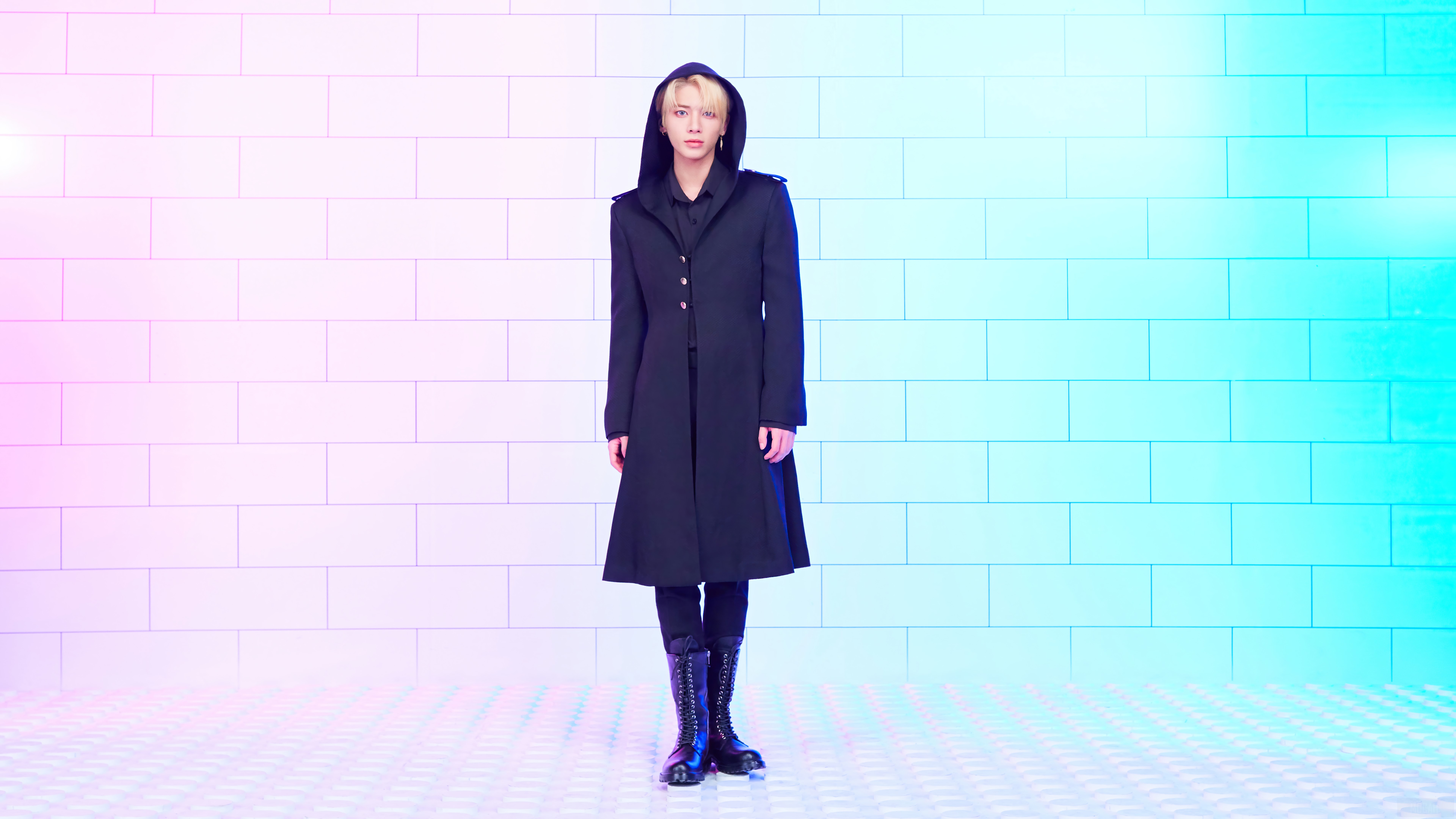 Taehyun from TXT wearing a black hooded coat HD Wallpaper