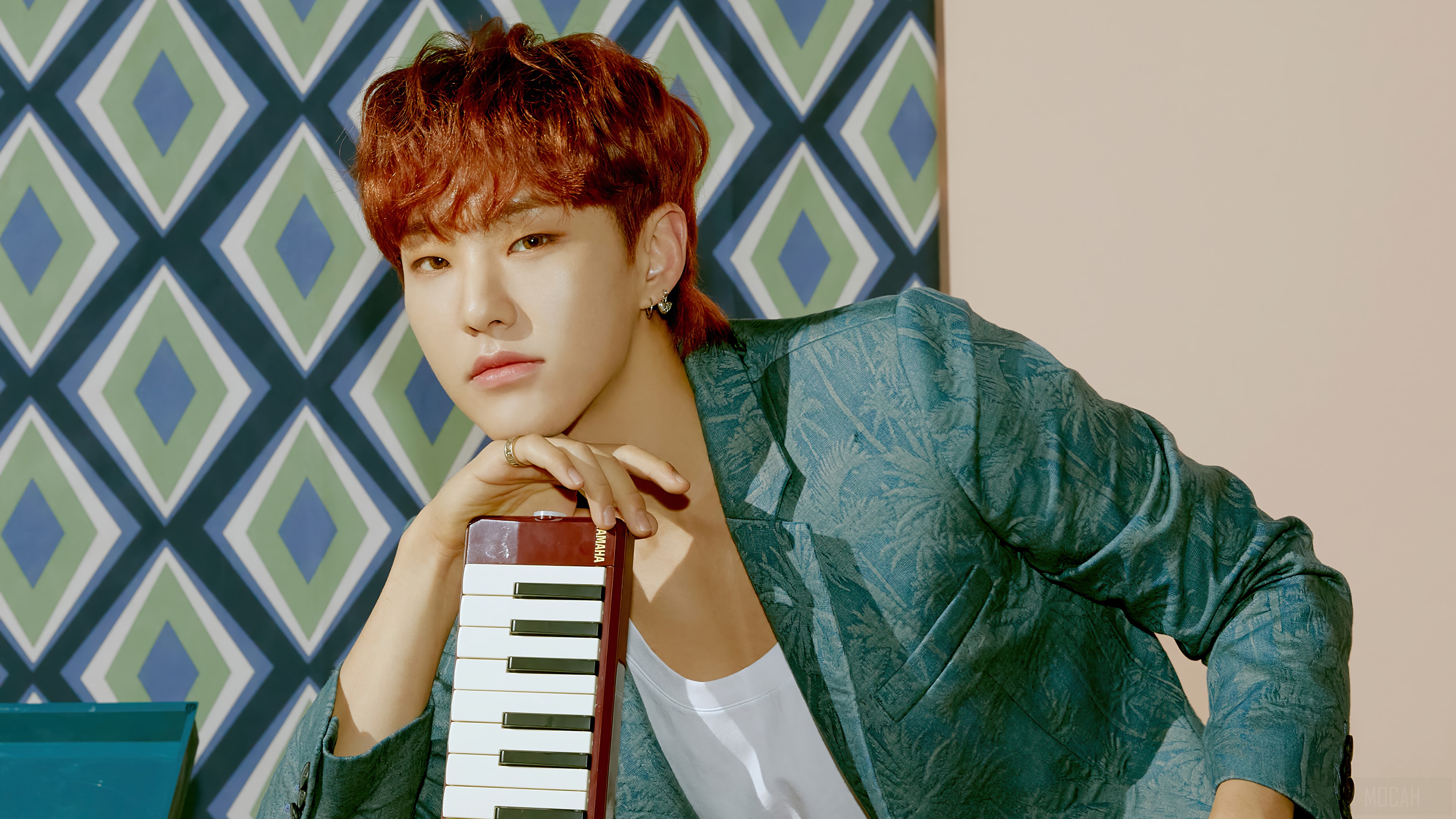 Hoshi from Seventeen holding a melodica HD Wallpaper