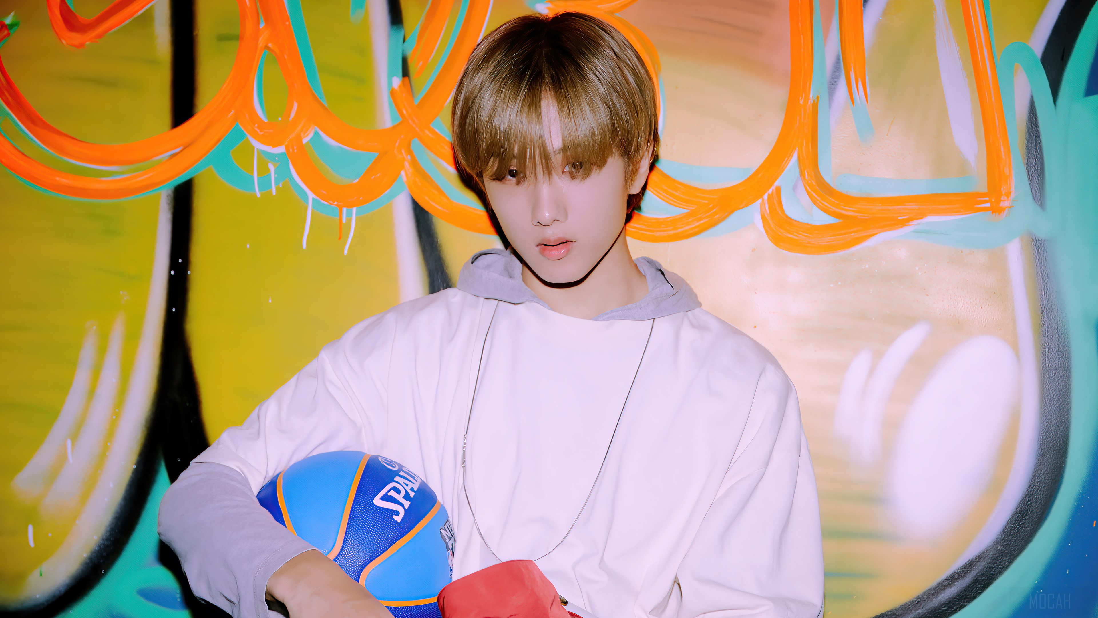 Jisung from NCT Dream holding a basketball HD Wallpaper