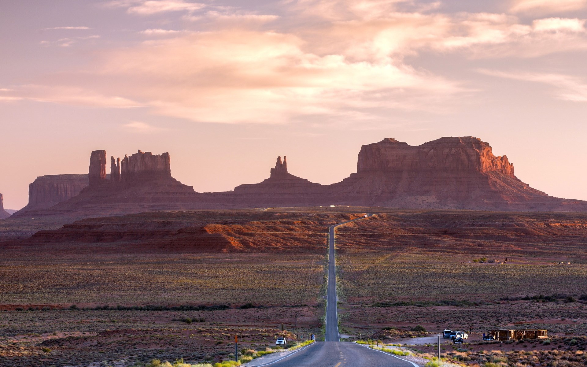 Monument Valley at sunset with a road HD Wallpaper