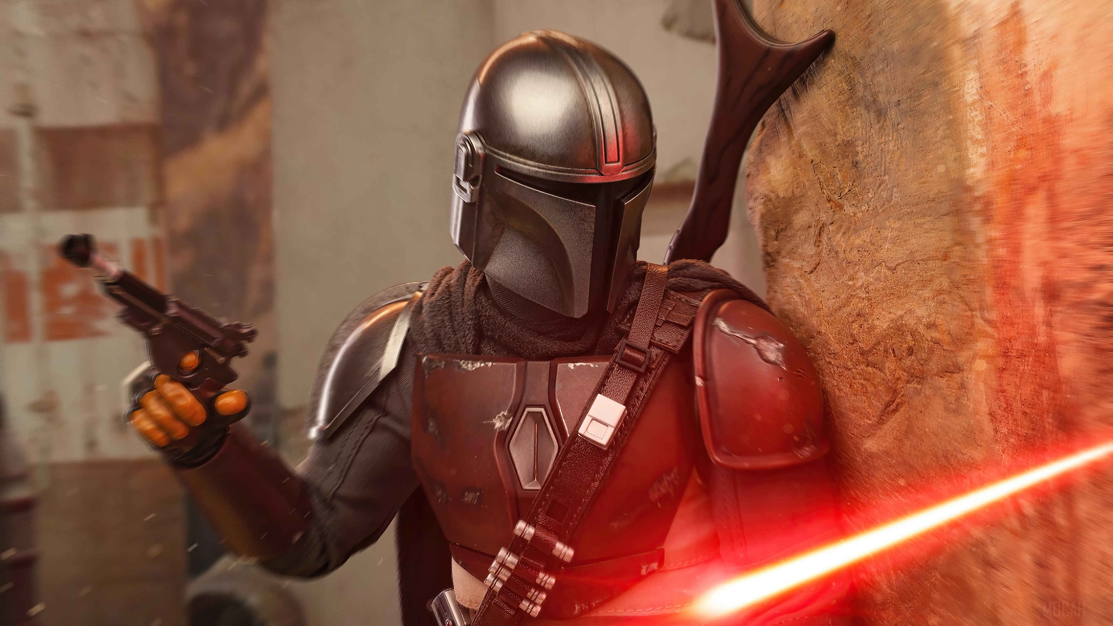 The Mandalorian in action with a blaster HD Wallpaper