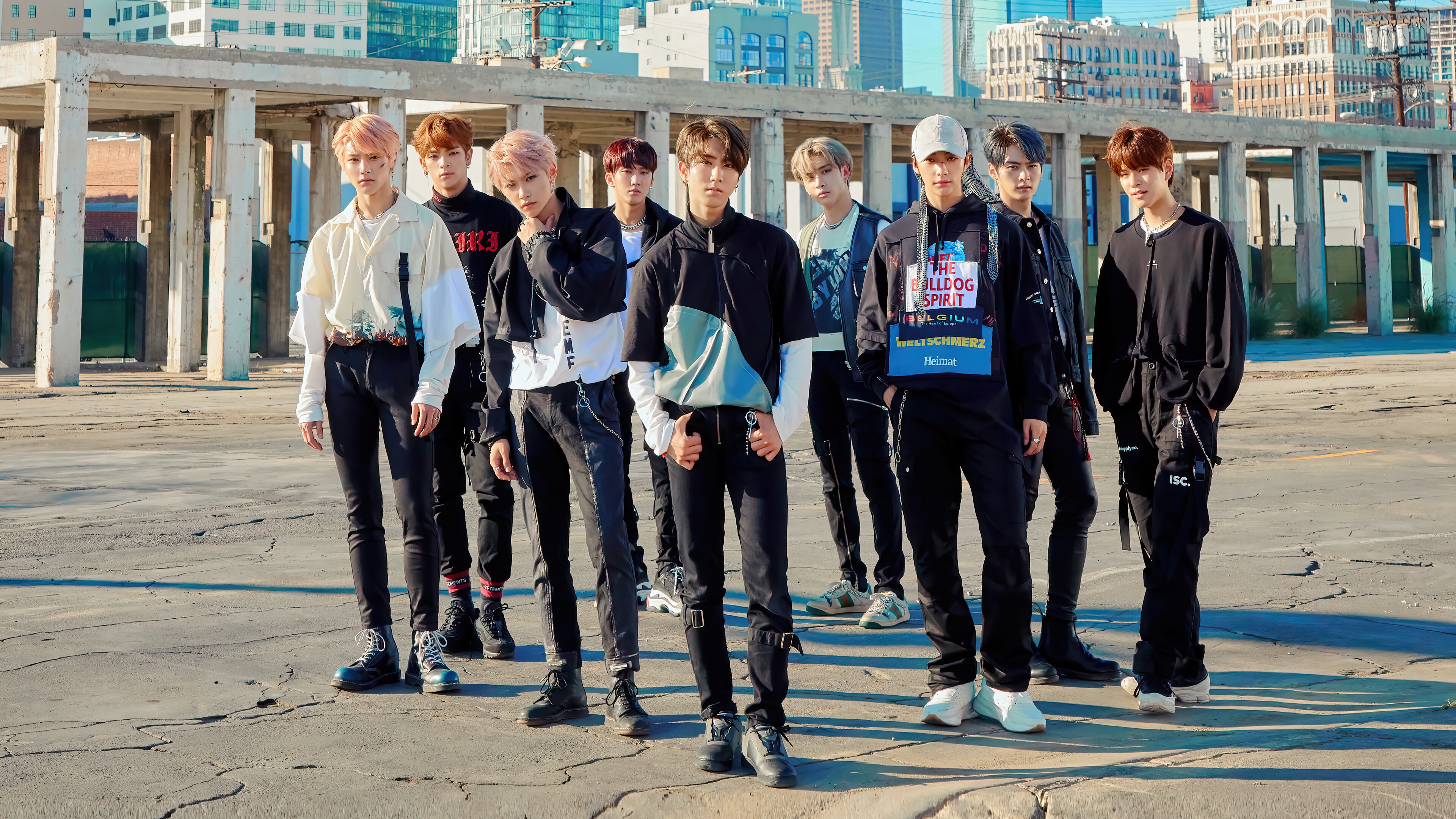 Stray Kids Members in Urban Setting 4K HD Wallpaper