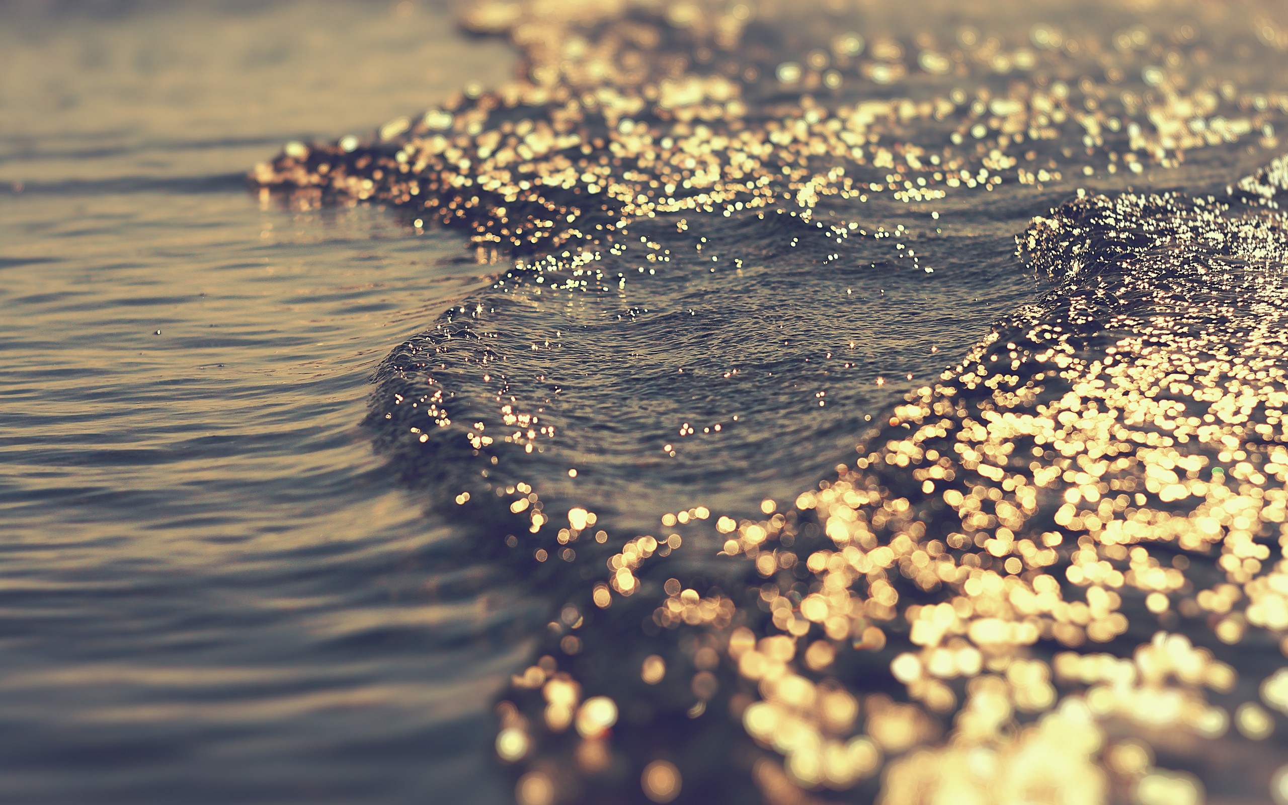 Sparkling ocean waves at sunset HD Wallpaper
