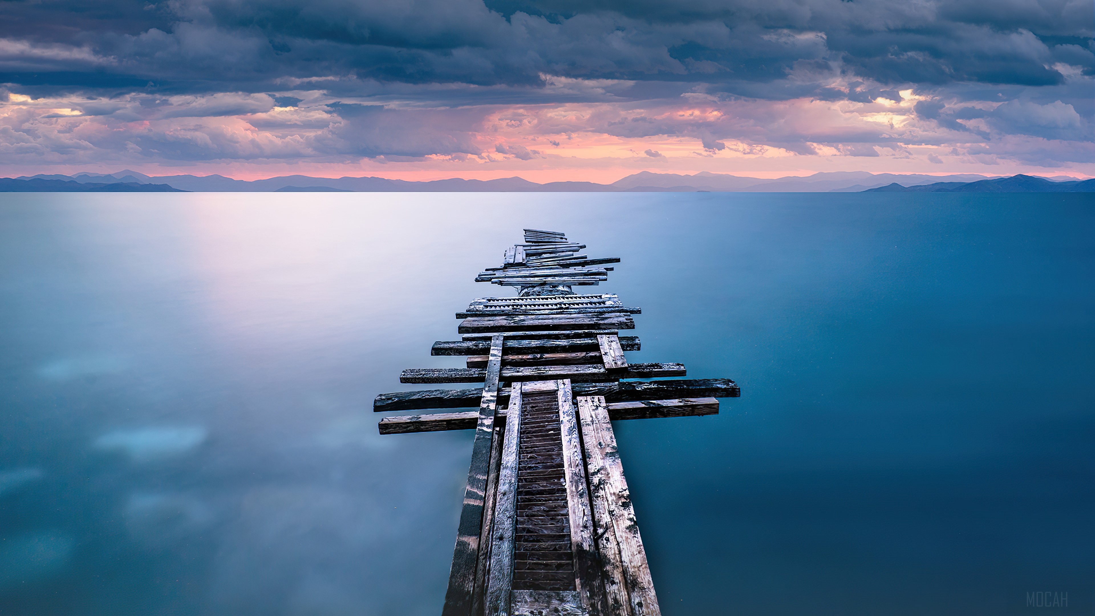 Calm Ocean Pier at Sunset 4K HD Wallpaper