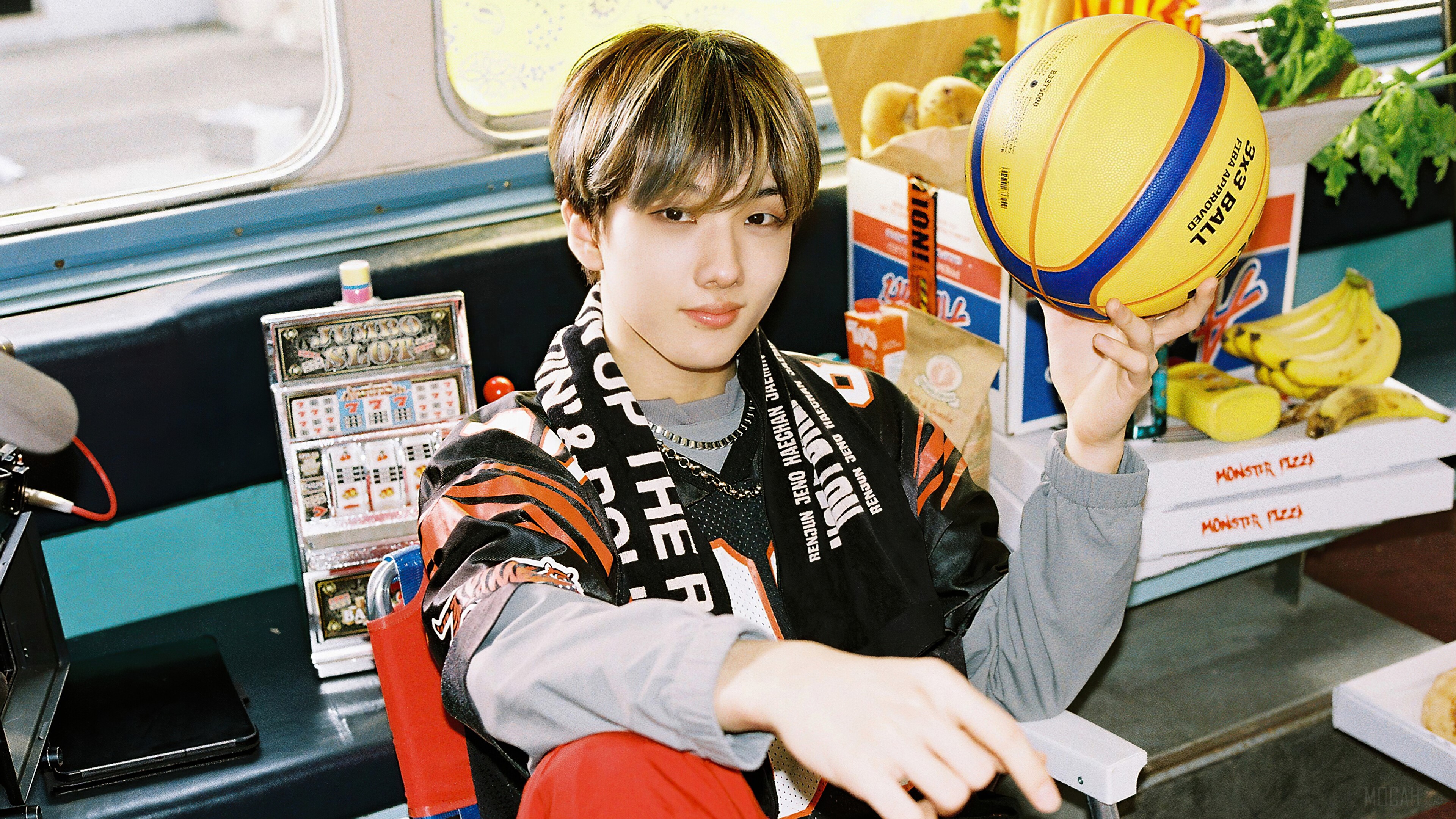 Jisung from NCT Dream holding a basketball HD Wallpaper