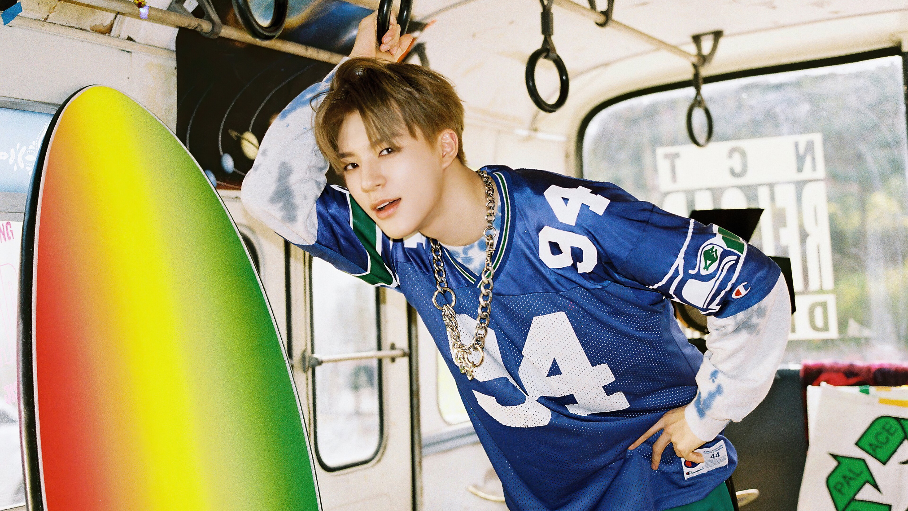Jeno from NCT Dream with a surfboard HD Wallpaper
