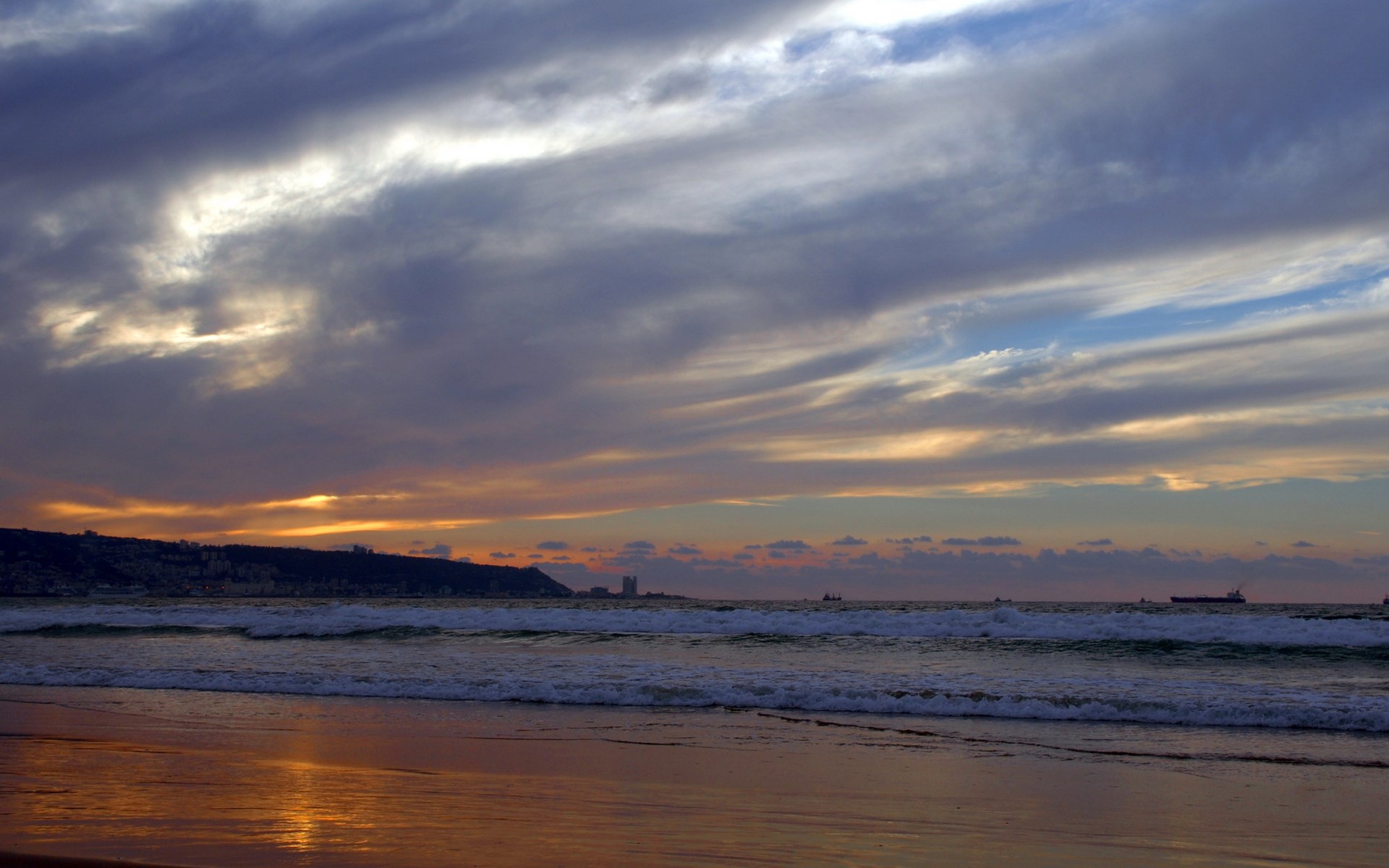 Sunset over the sea with ships and city skyline HD Wallpaper