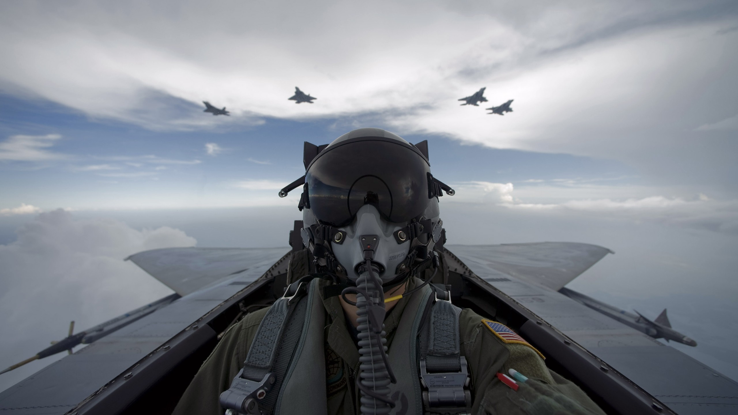 Pilot in fighter jet with other aircraft flying HD Wallpaper