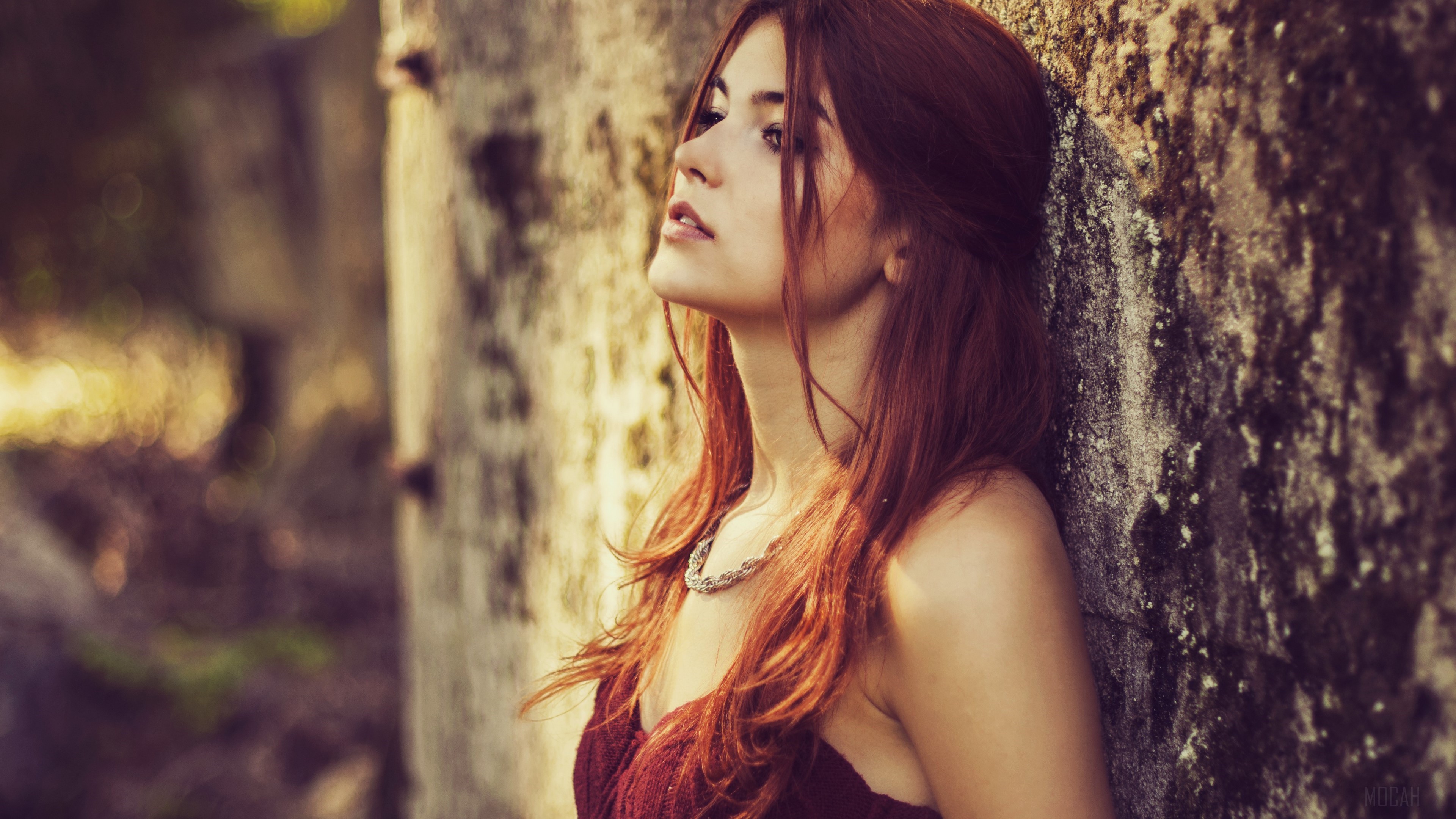 Woman with red hair leaning against a wall HD Wallpaper