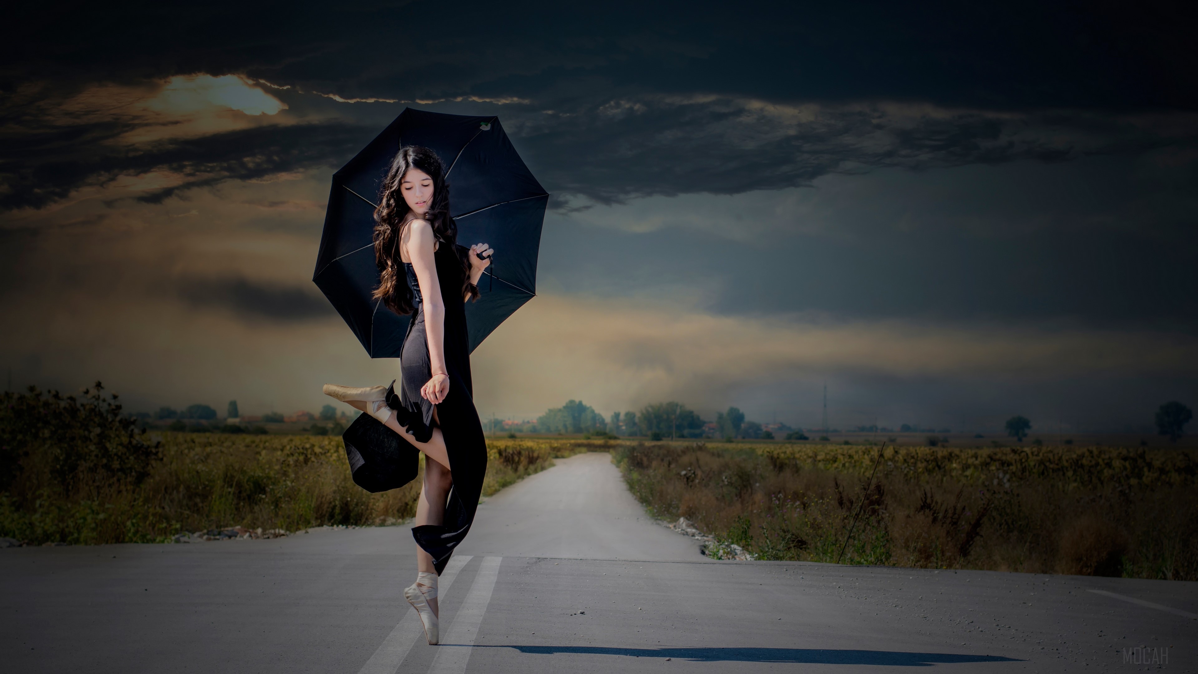 Woman in black dress with umbrella on road HD Wallpaper