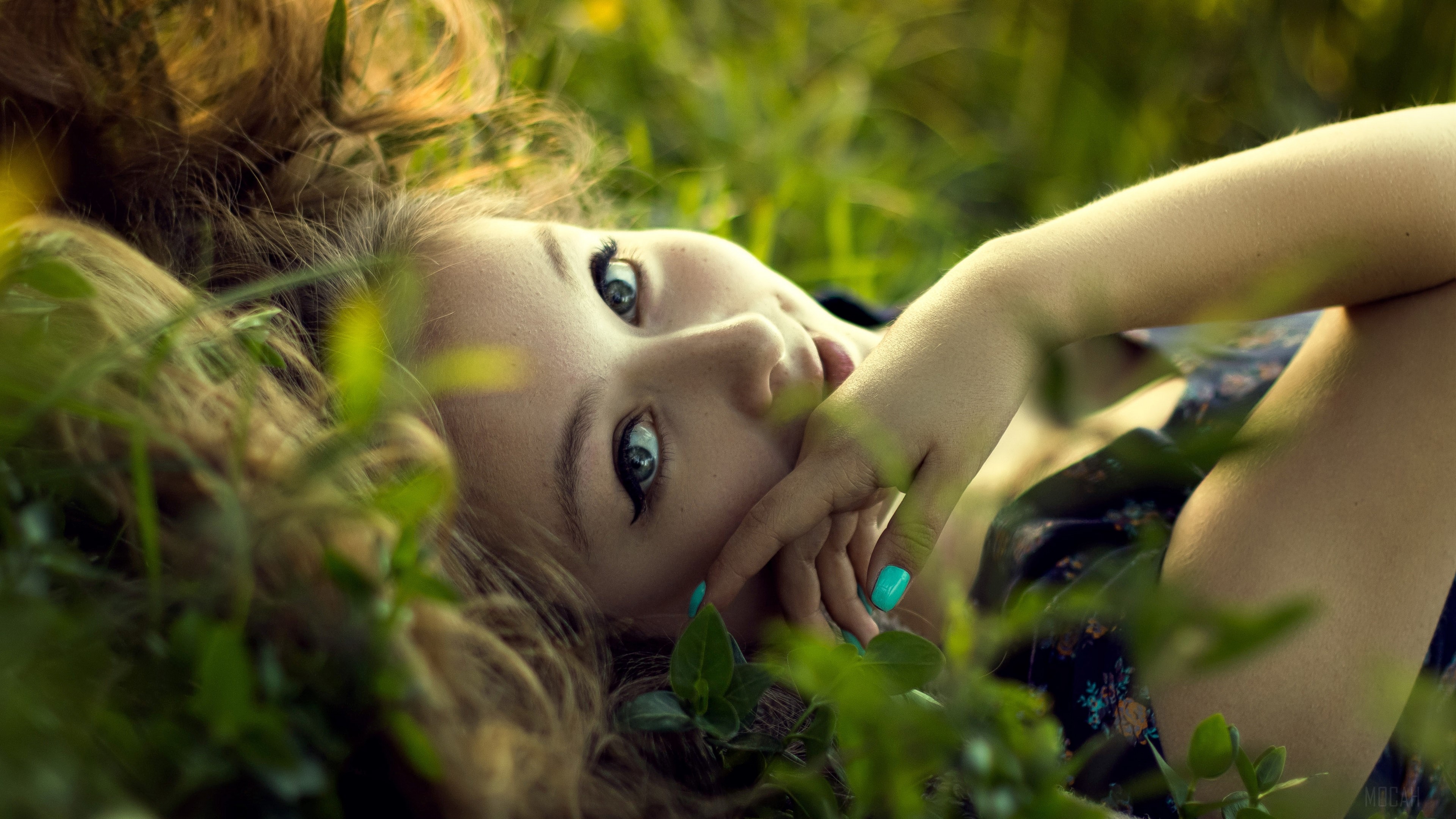 Girl lying in grass 4K HD Wallpaper