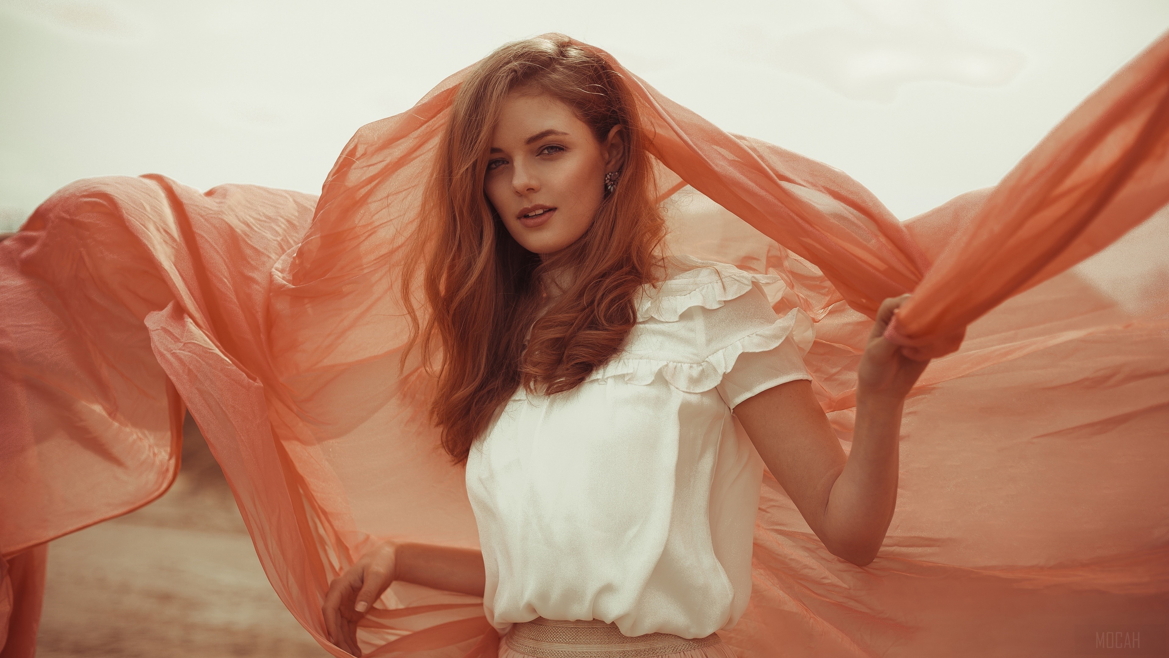 Redhead Woman with Flowing Orange Fabric in 4K HD Wallpaper