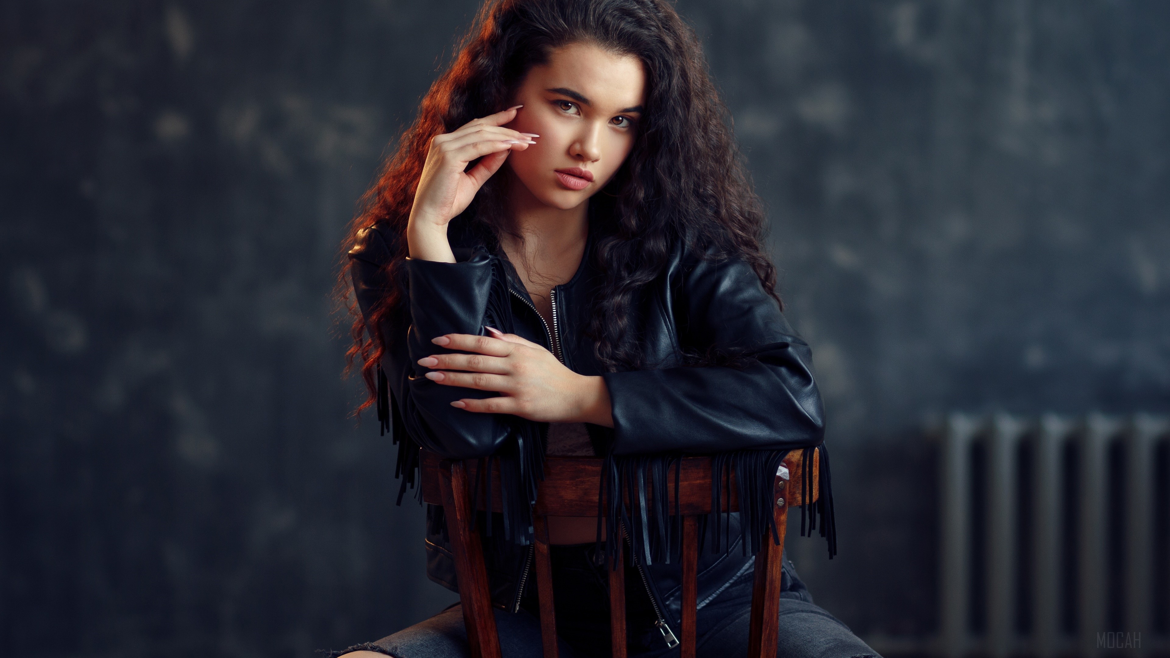 Woman with long black hair wearing a leather jacket 4K HD Wallpaper
