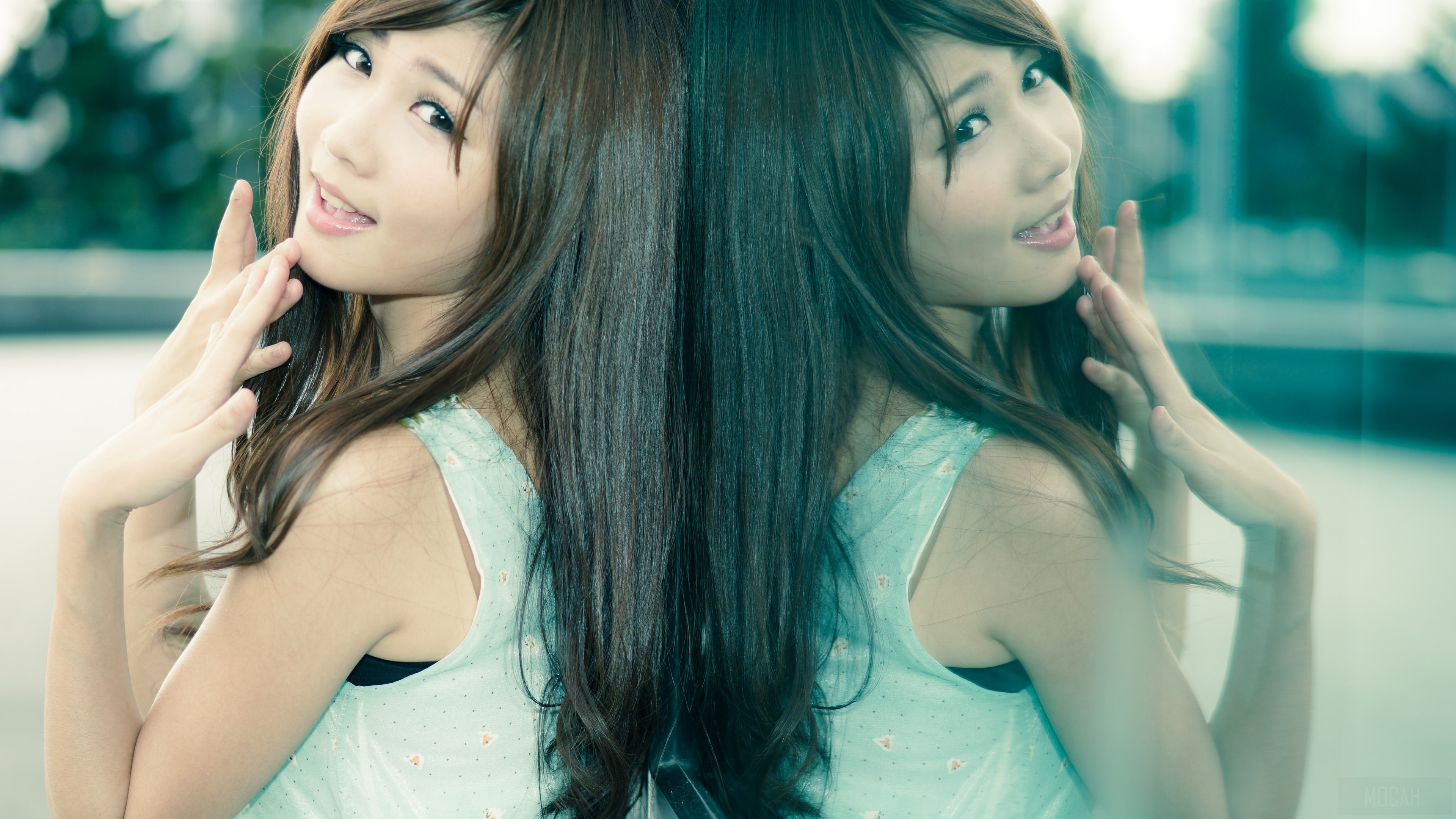 Young woman with long brown hair posing HD Wallpaper