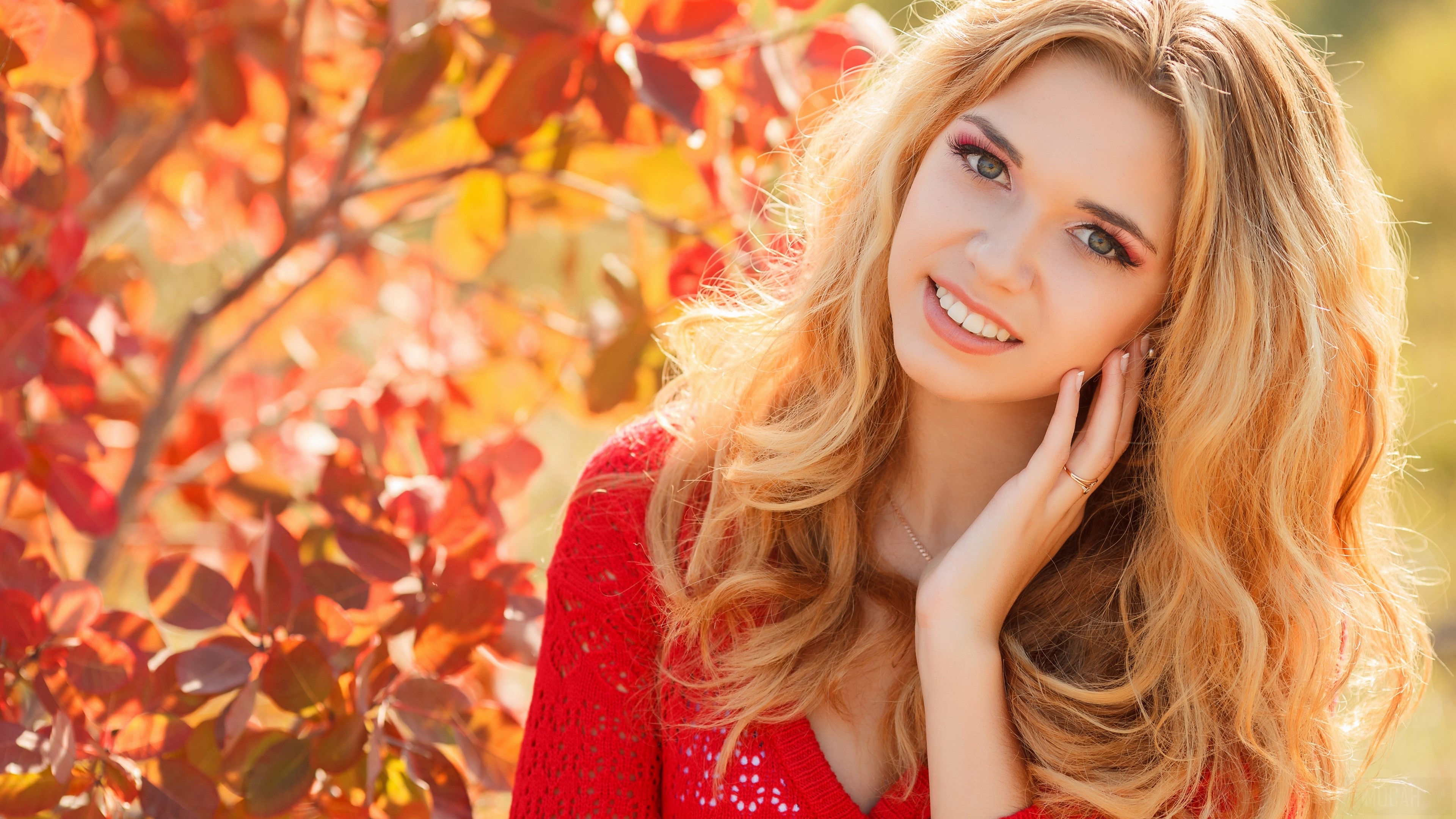 Woman with blonde hair in red sweater HD Wallpaper