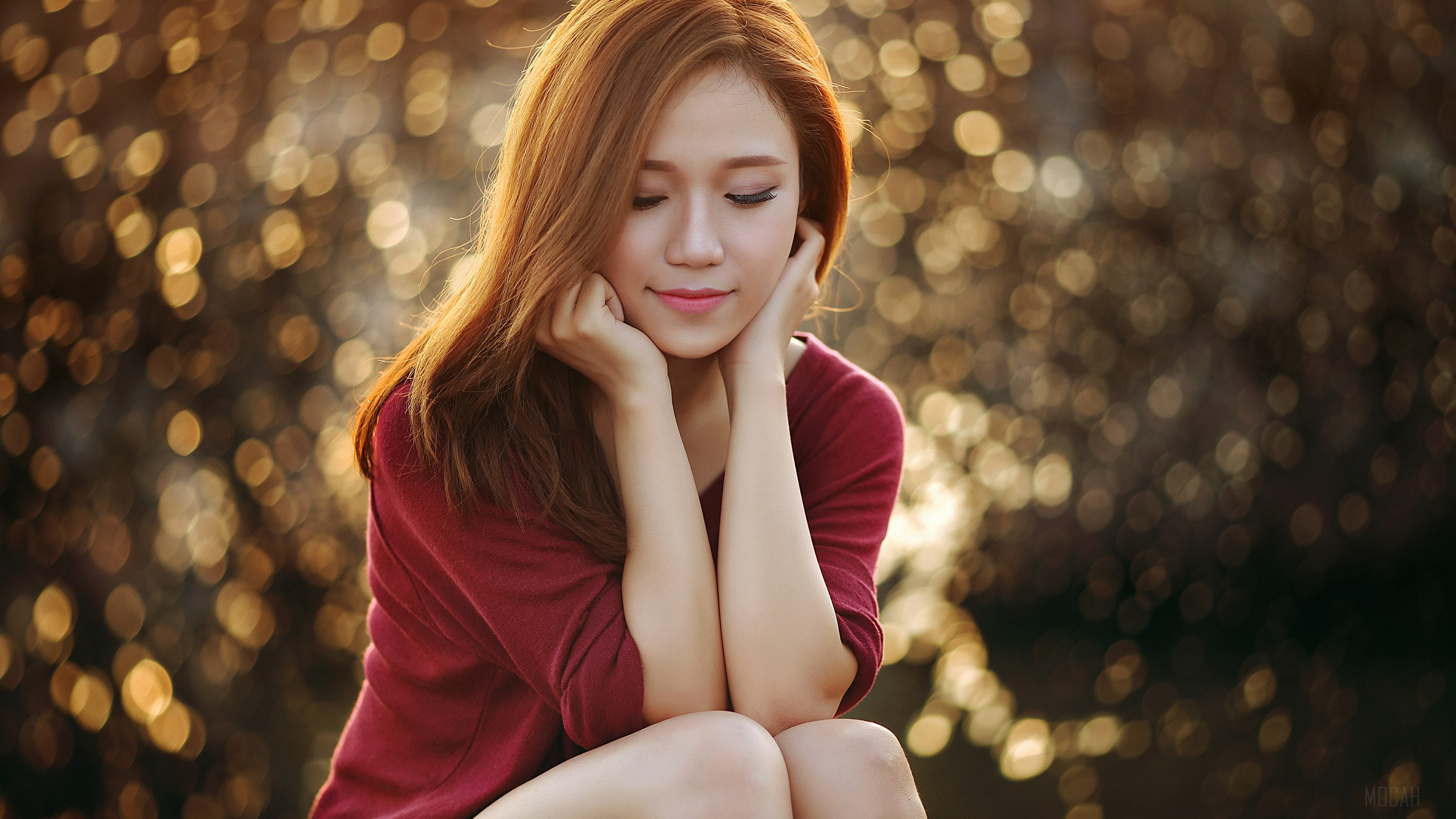 Young woman with auburn hair in a maroon shirt HD Wallpaper