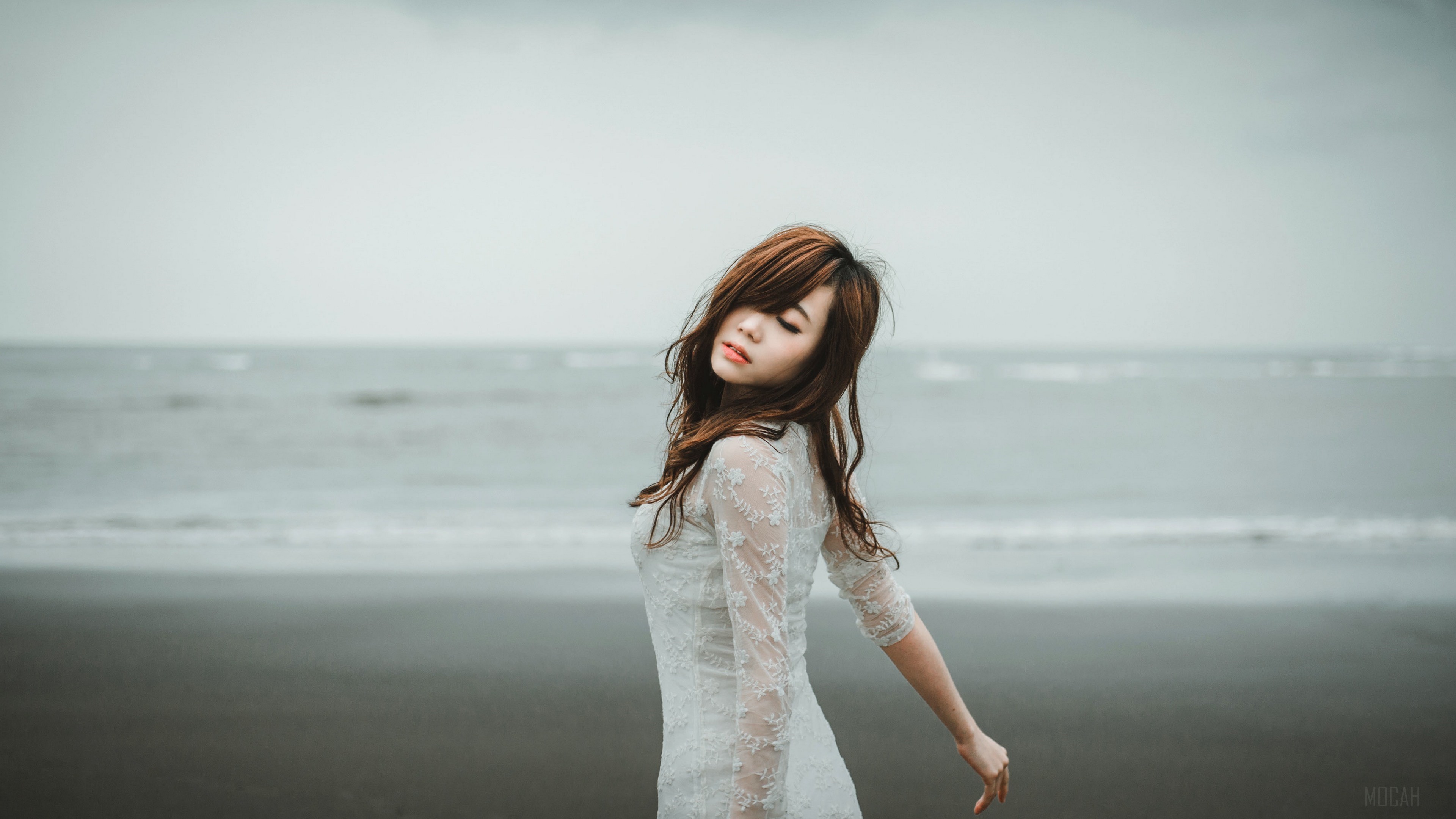 Woman in white dress on a beach HD Wallpaper