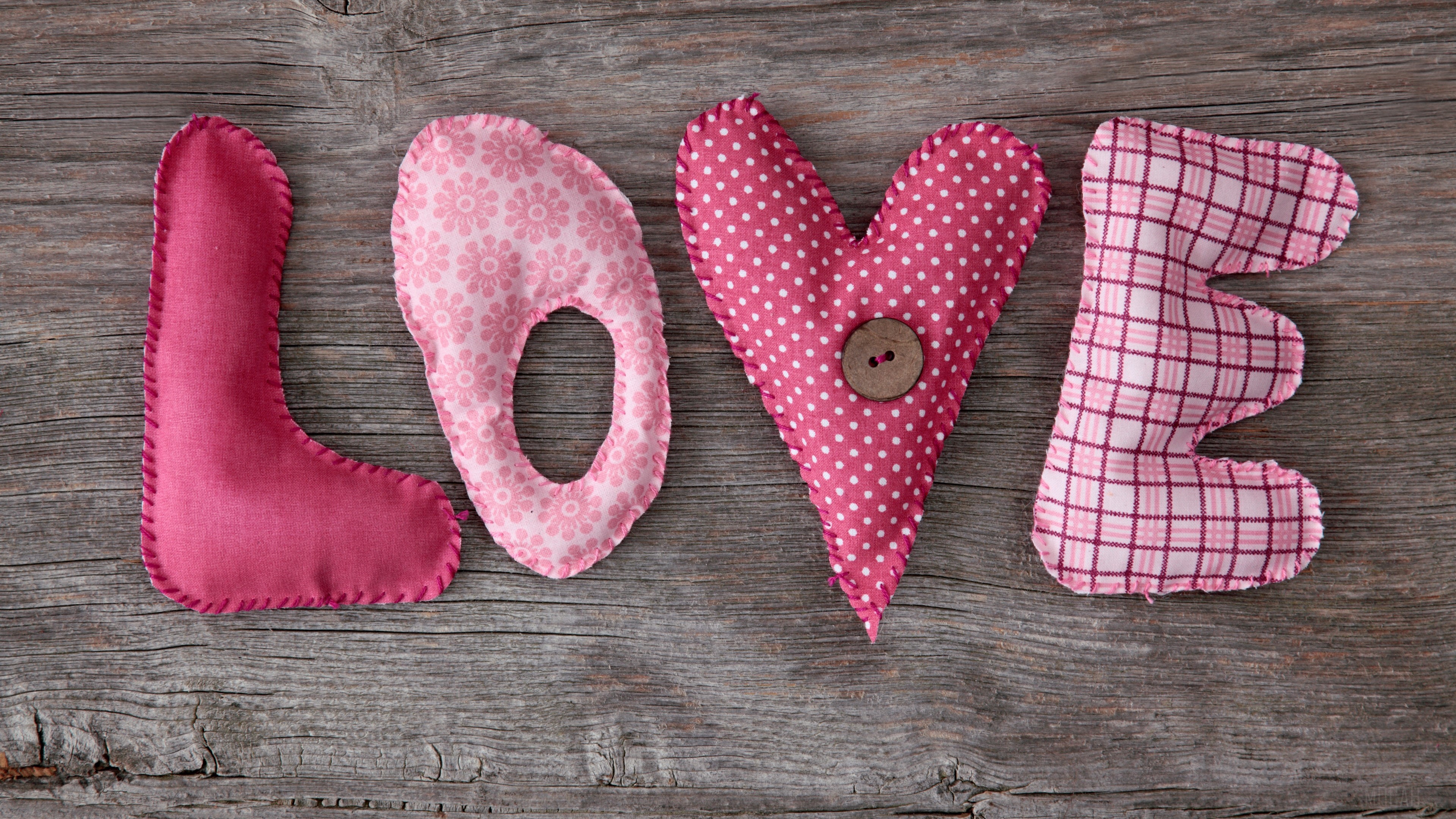 Fabric letters spelling LOVE on wood HD Wallpaper
