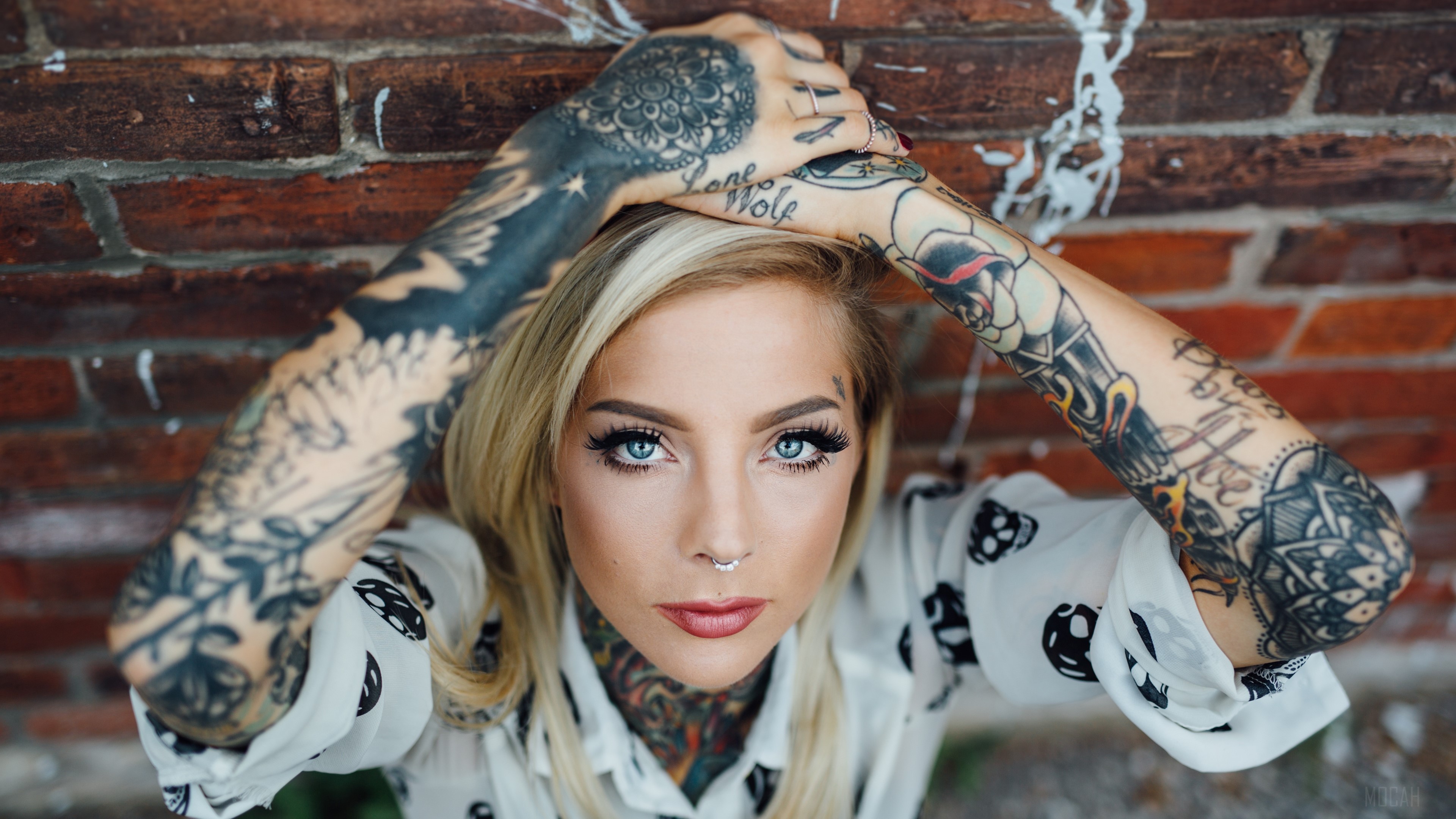 Woman with Tattoos and Blue Eyes 4K HD Wallpaper