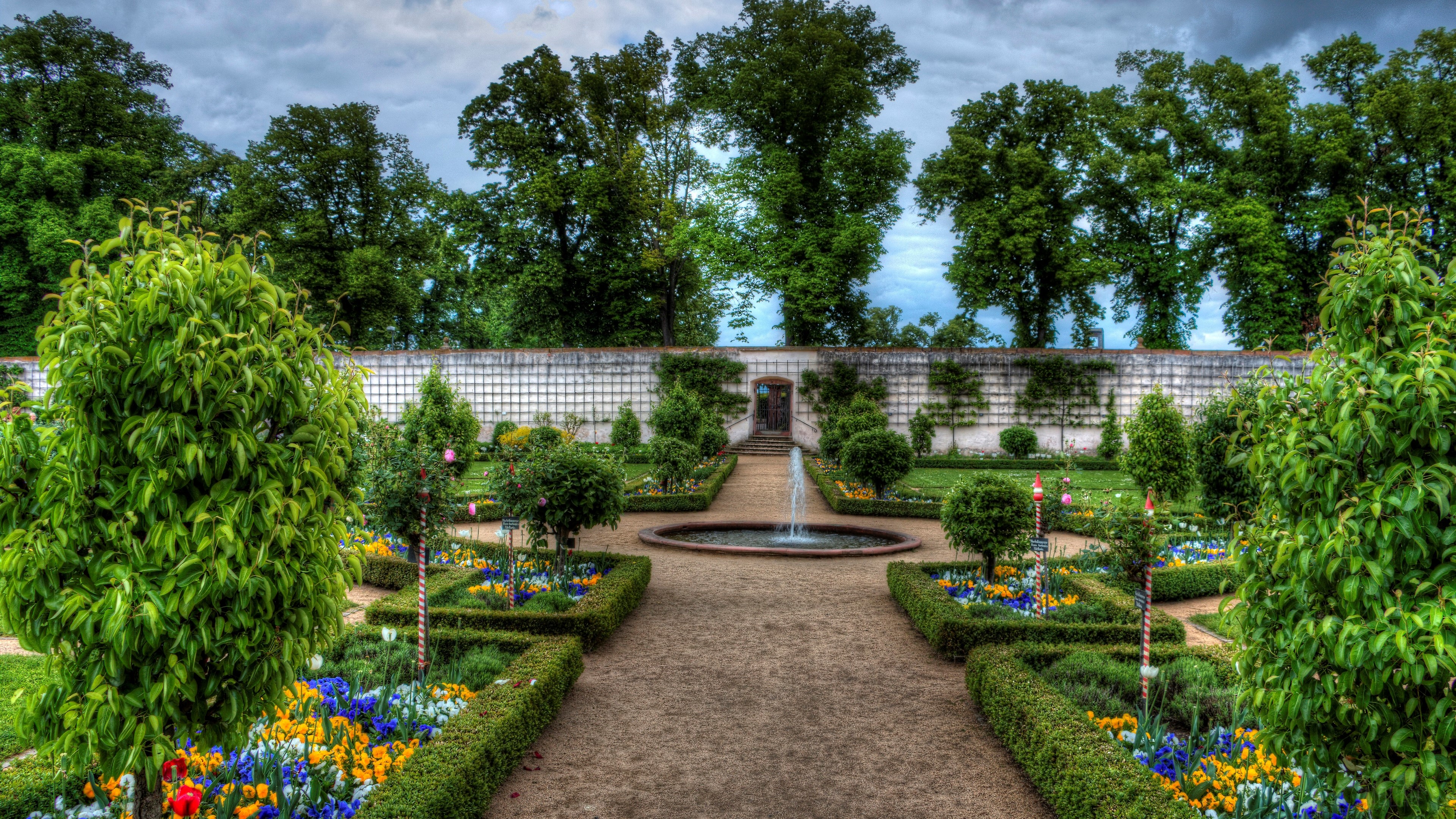 Formal Garden with Fountain and Flowers HD Wallpaper