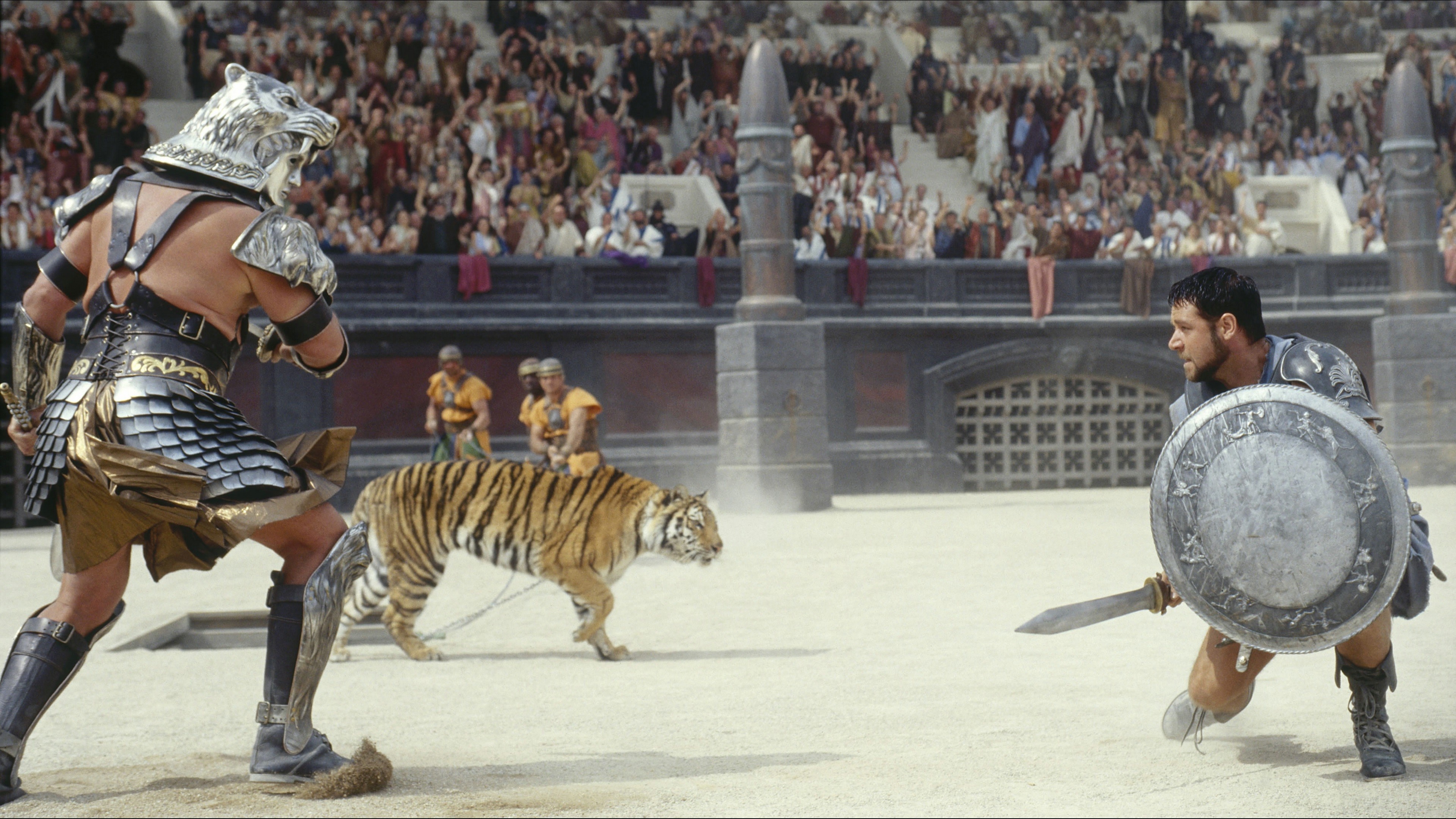 Gladiator fighting a tiger in an arena HD Wallpaper