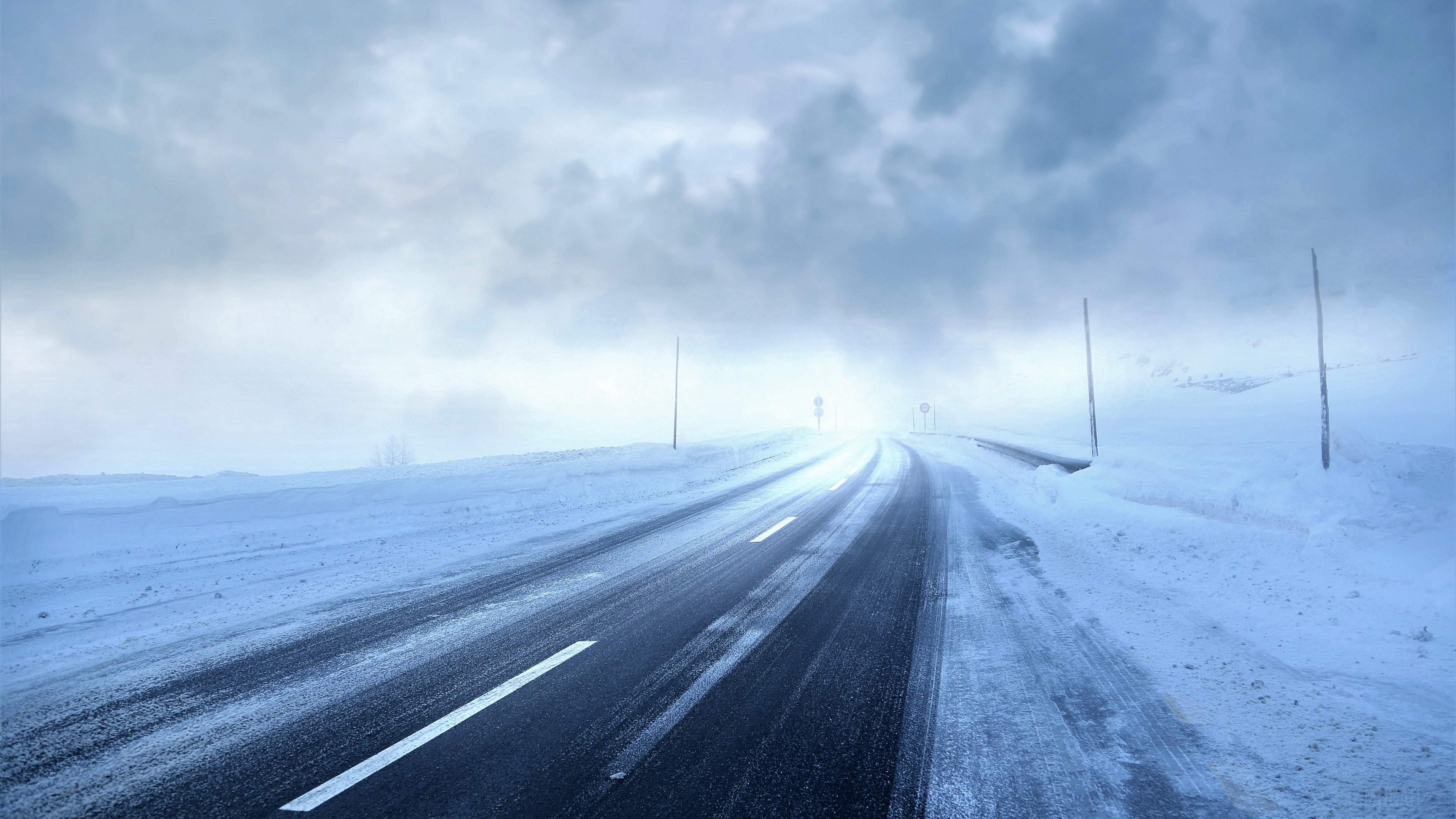 Snowy Road in a Winter Storm 4K HD Wallpaper