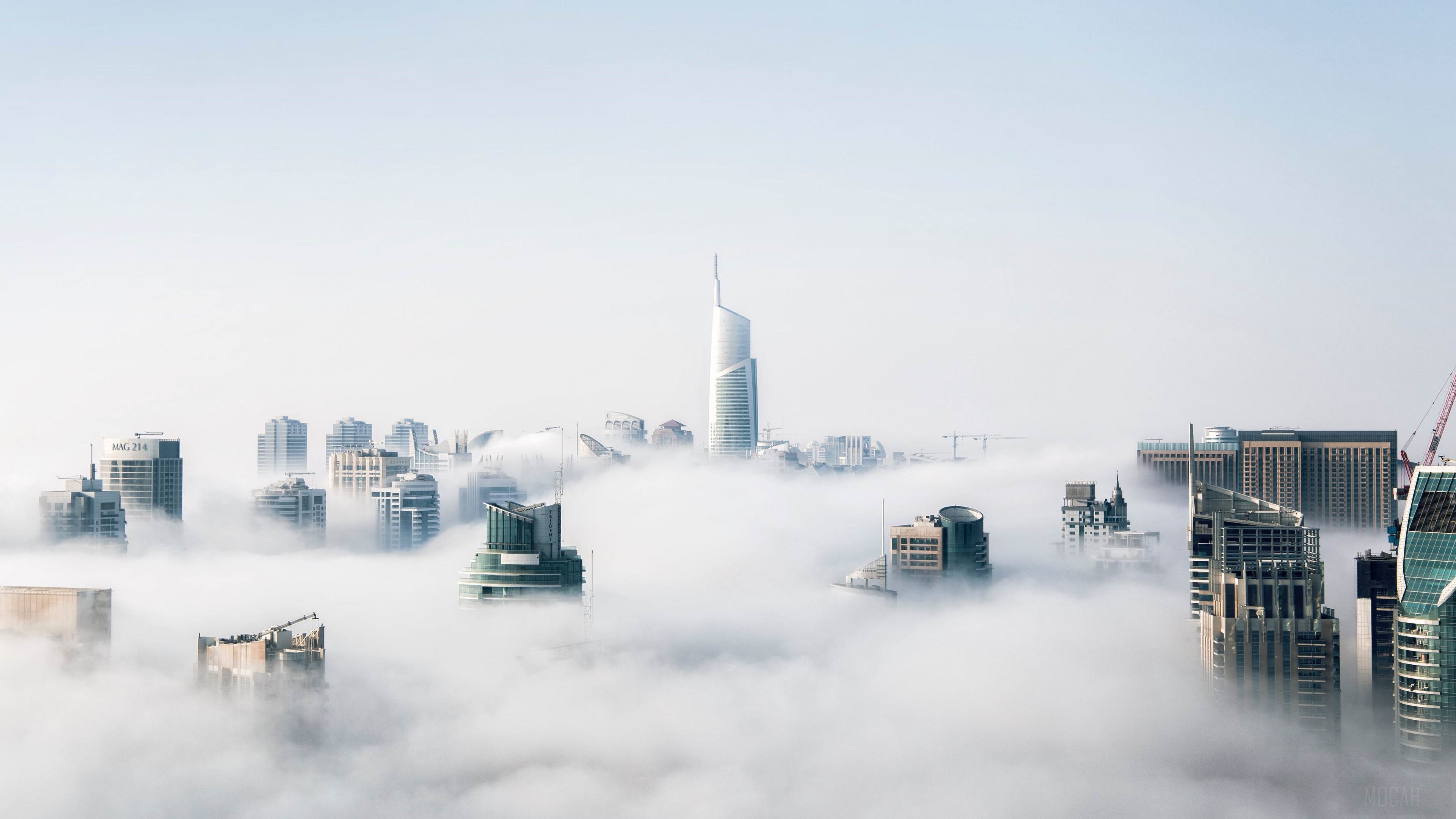 Dubai skyscrapers emerging from fog 4K HD Wallpaper