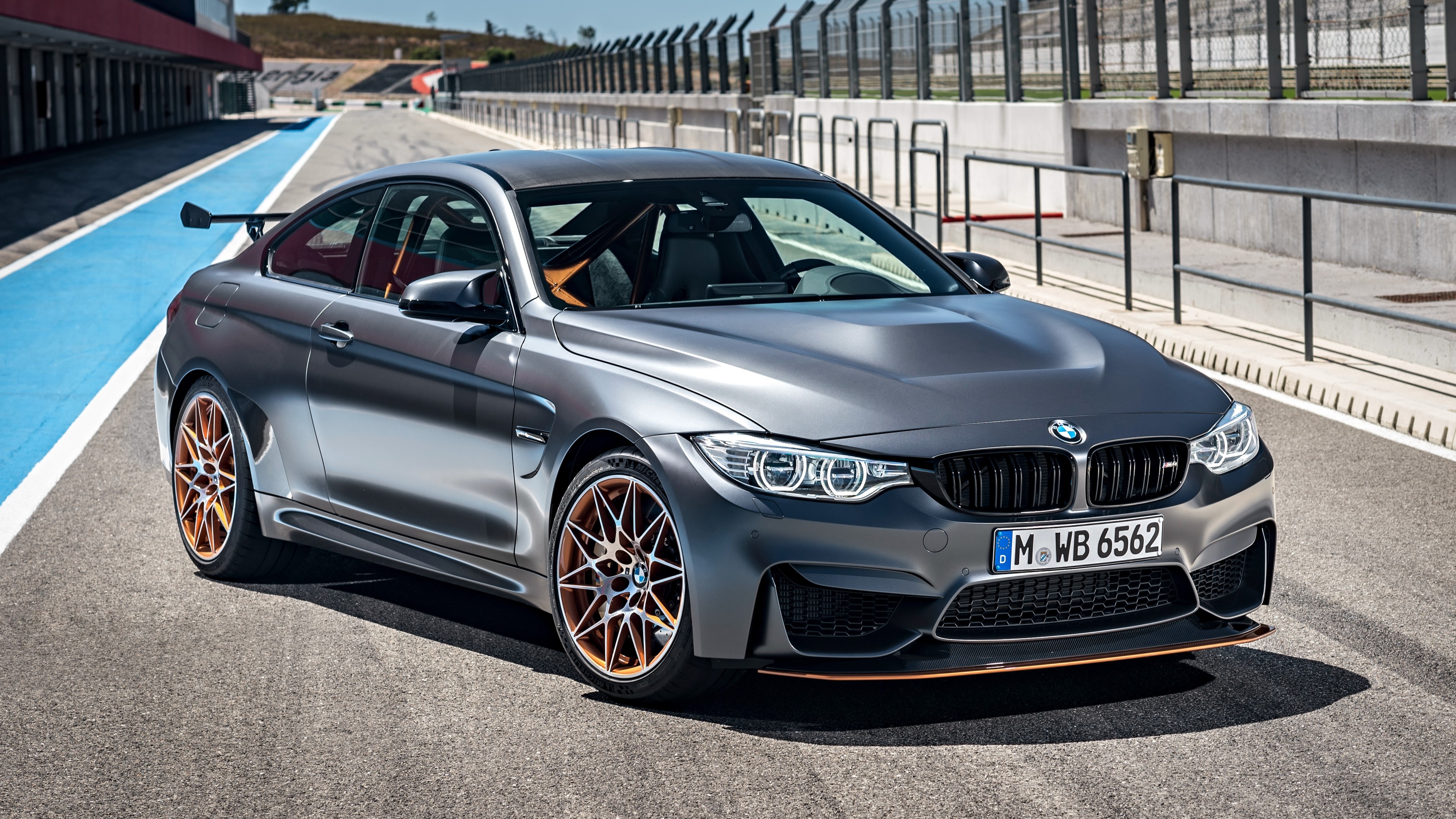 BMW M4 Coupe on a Race Track HD Wallpaper