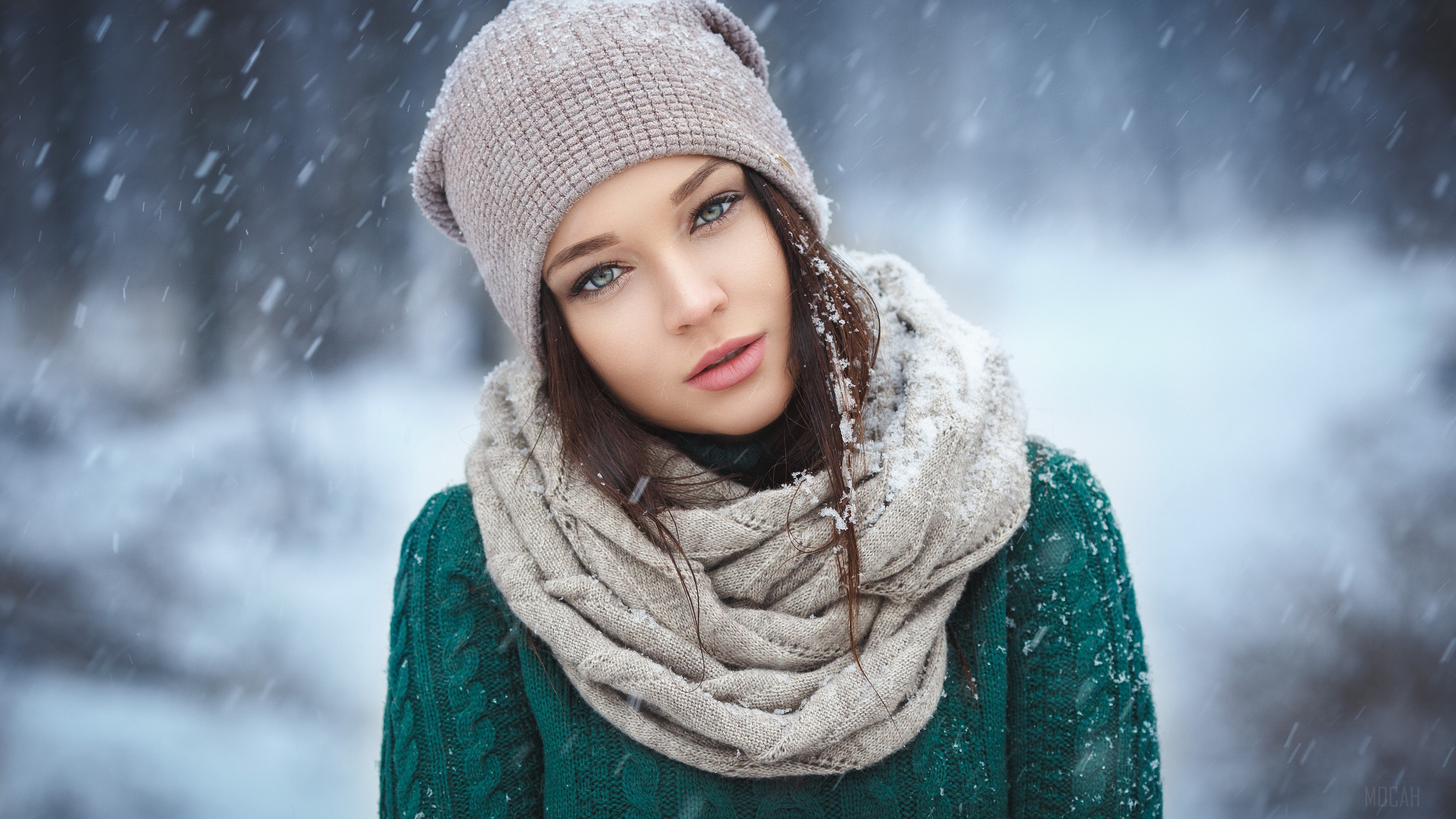 Woman in winter hat and scarf in snow HD Wallpaper