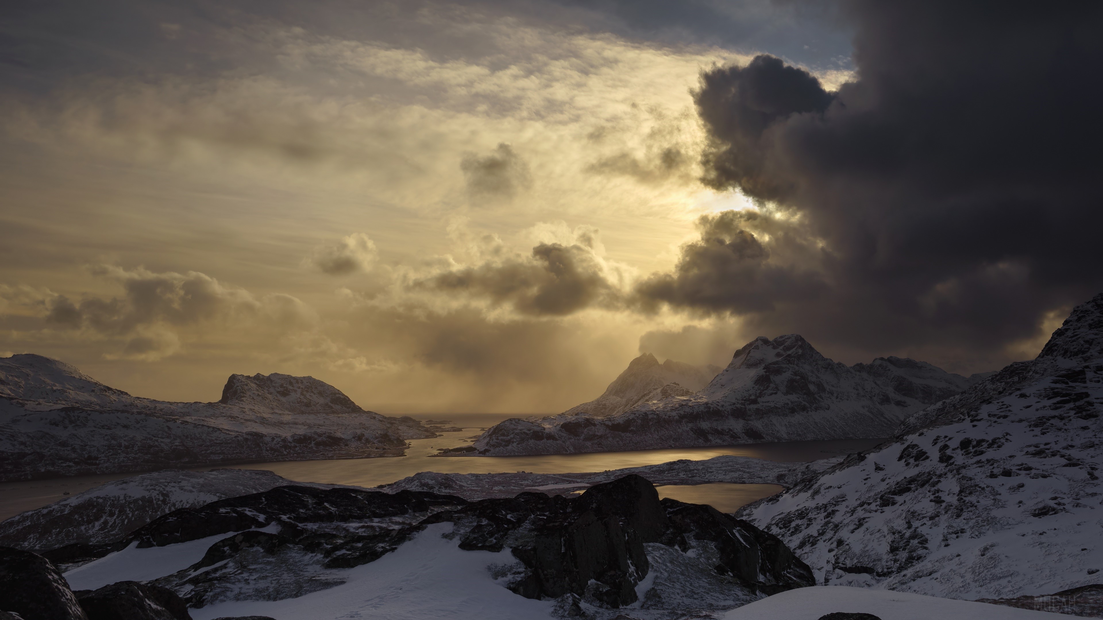 Snowy mountains and sea under dramatic clouds HD Wallpaper
