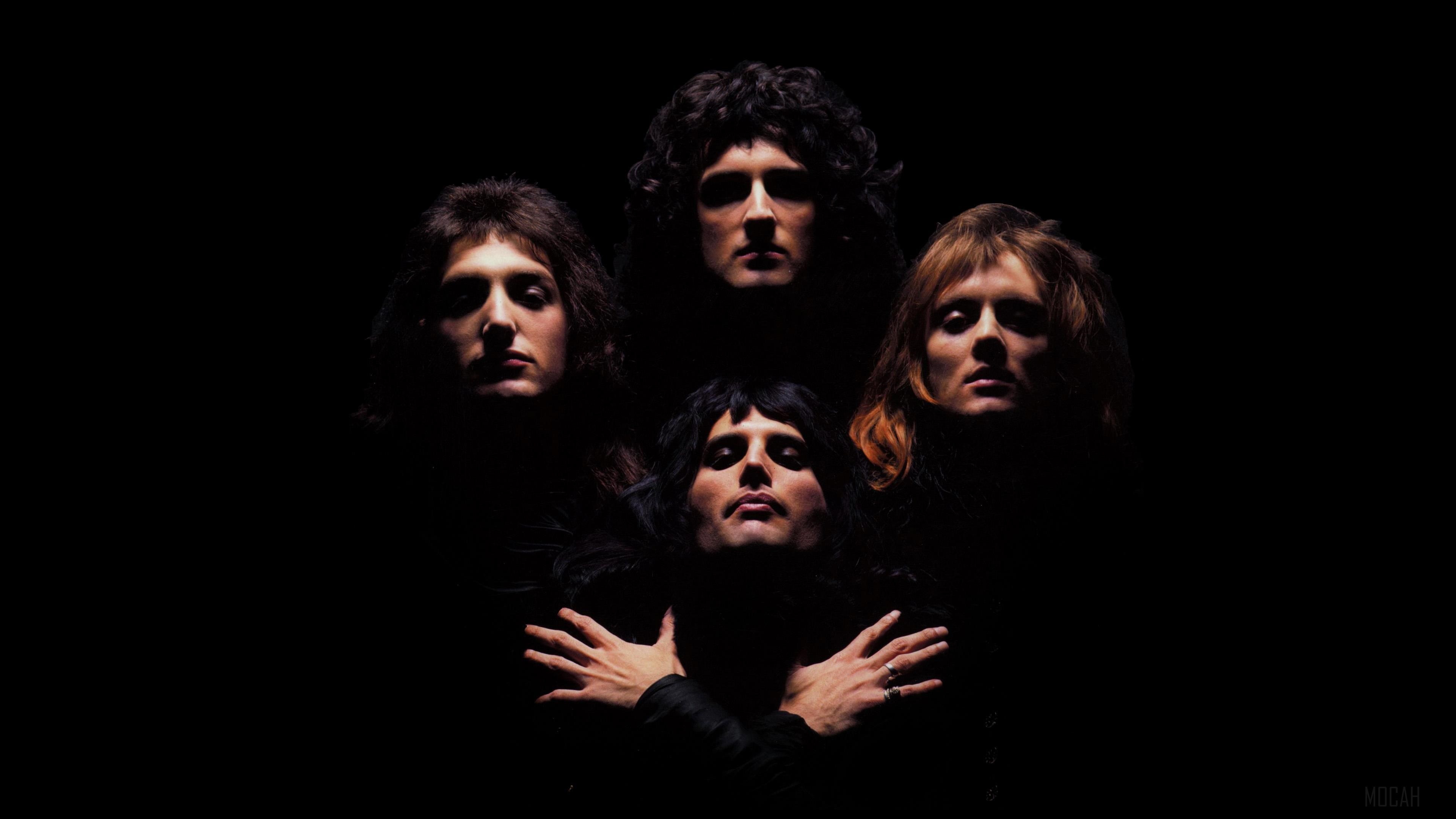 Queen band members in dark lighting HD Wallpaper