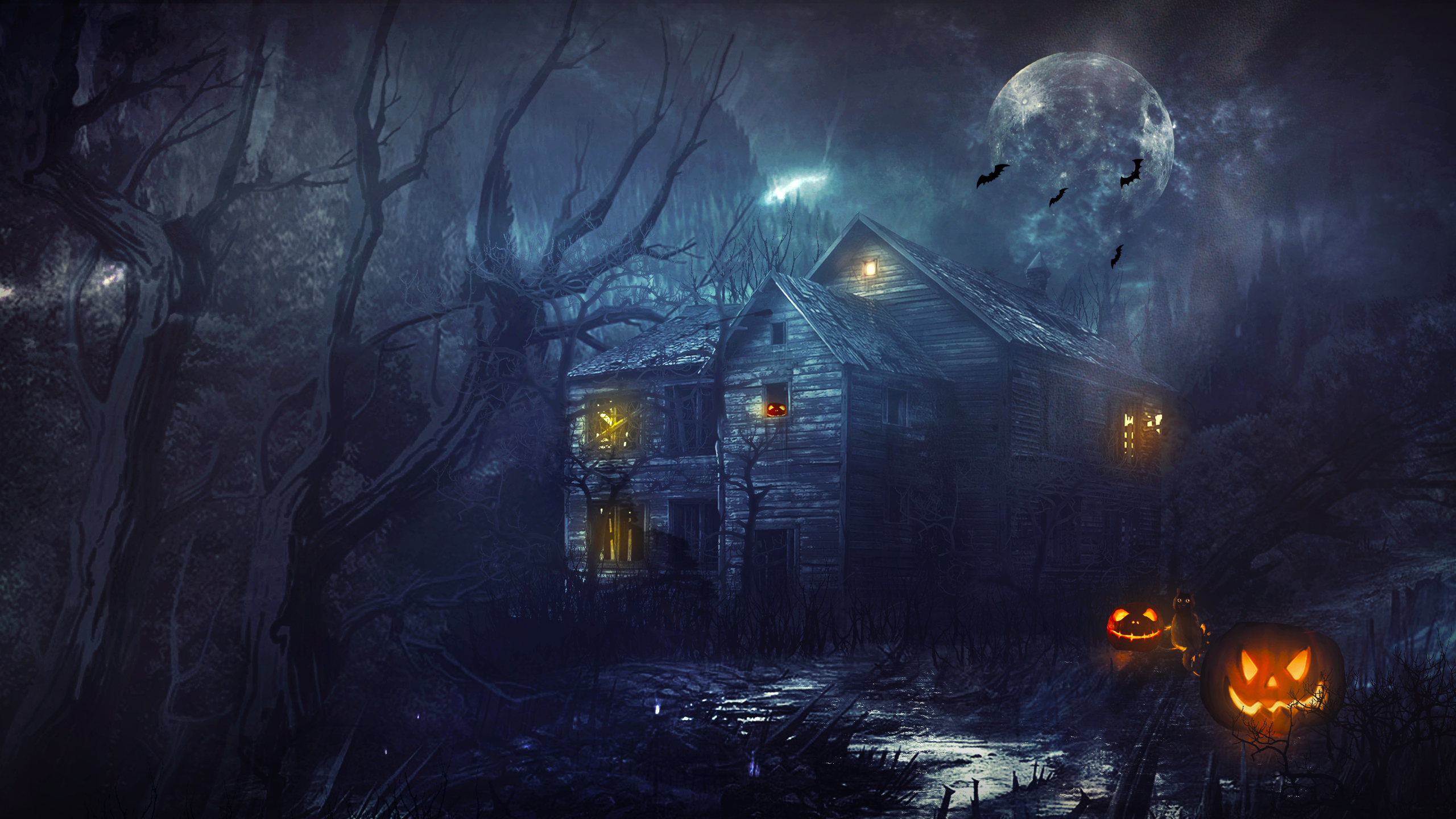 Spooky Halloween house with pumpkins and bats under the moon HD Wallpaper