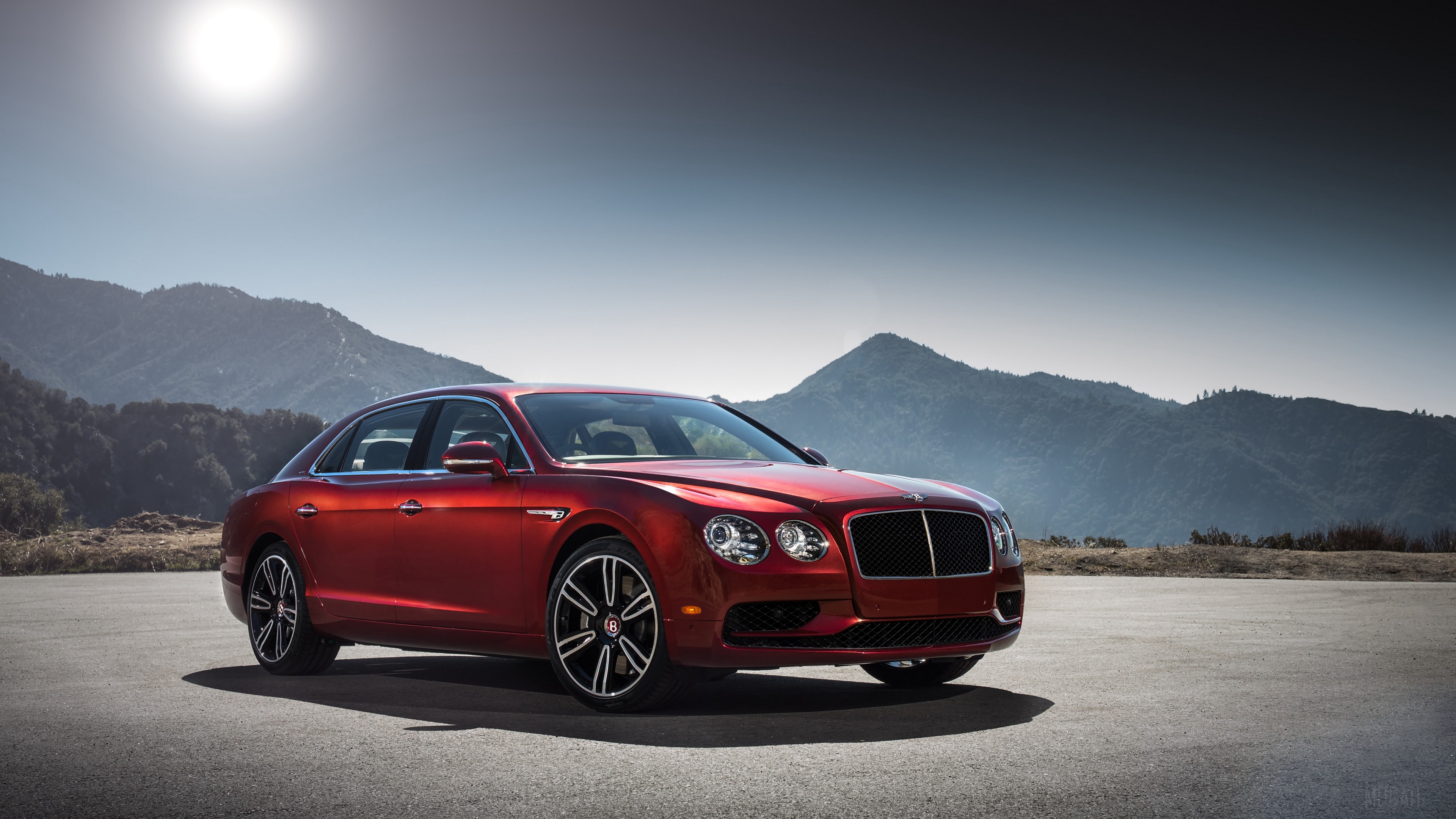 Red Bentley Flying Spur luxury car on asphalt road HD Wallpaper