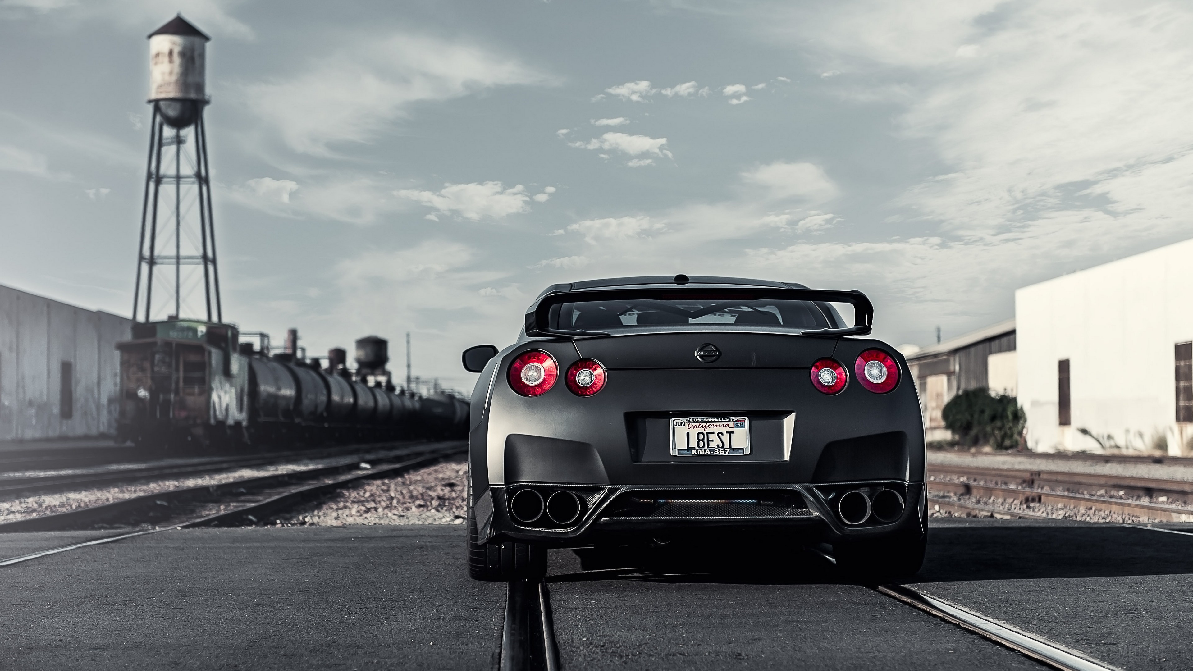 Black Nissan GT-R with "L8EST" license plate HD Wallpaper