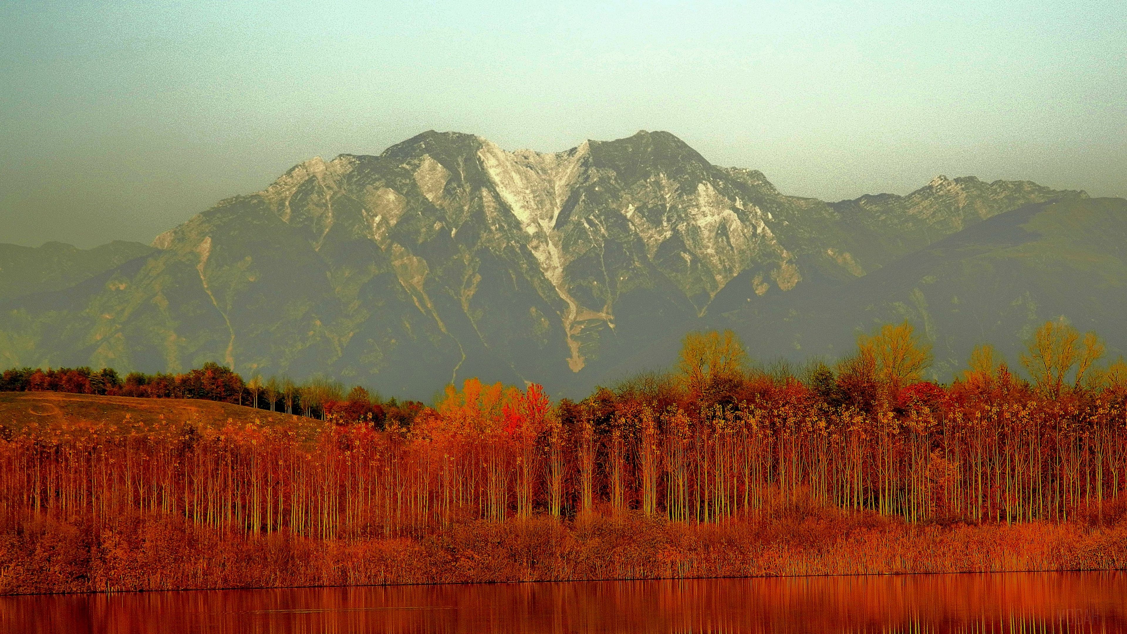 Mountain range with autumn trees and lake HD Wallpaper