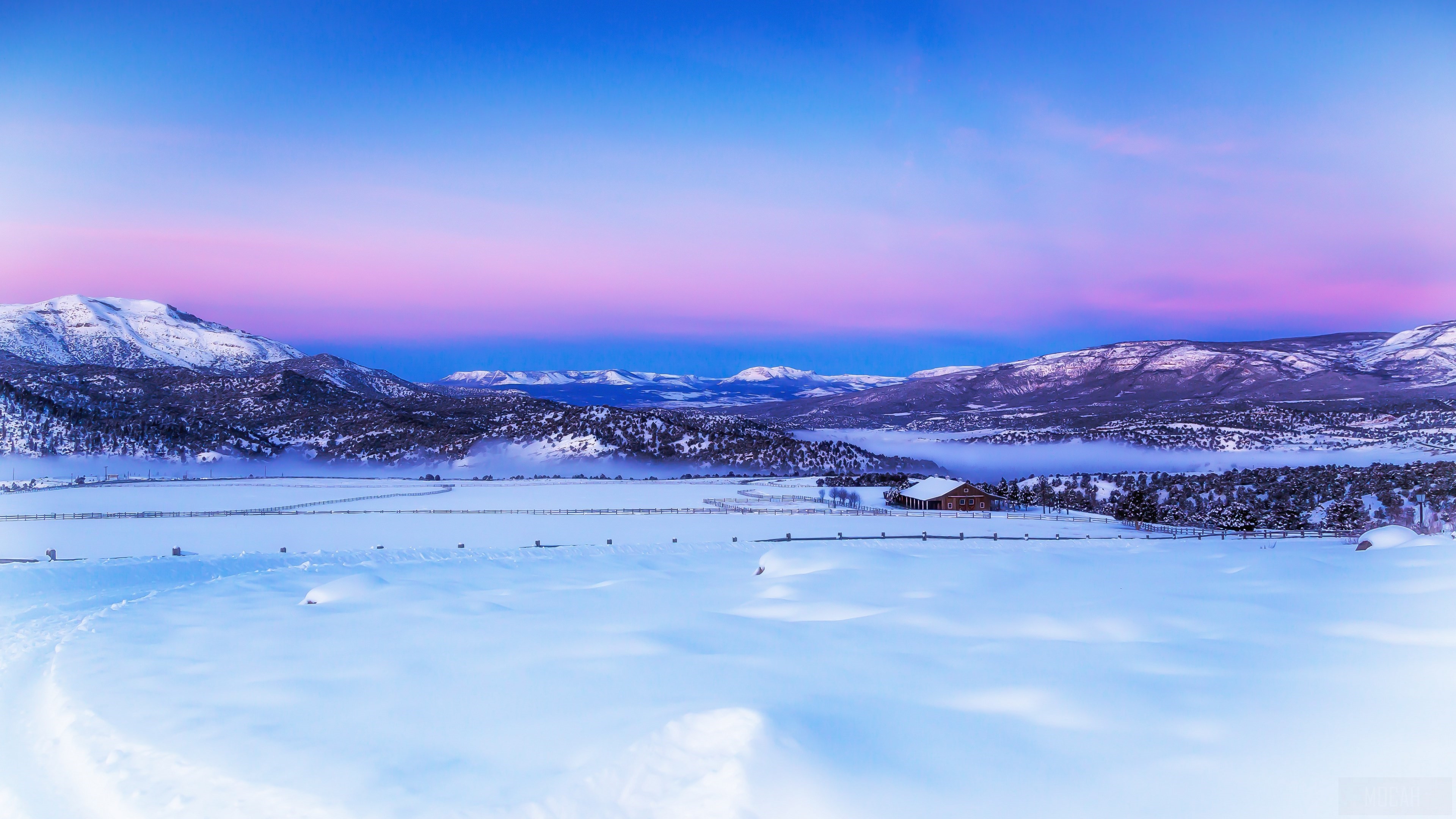 Winter landscape with snow-covered mountains and a cabin HD Wallpaper