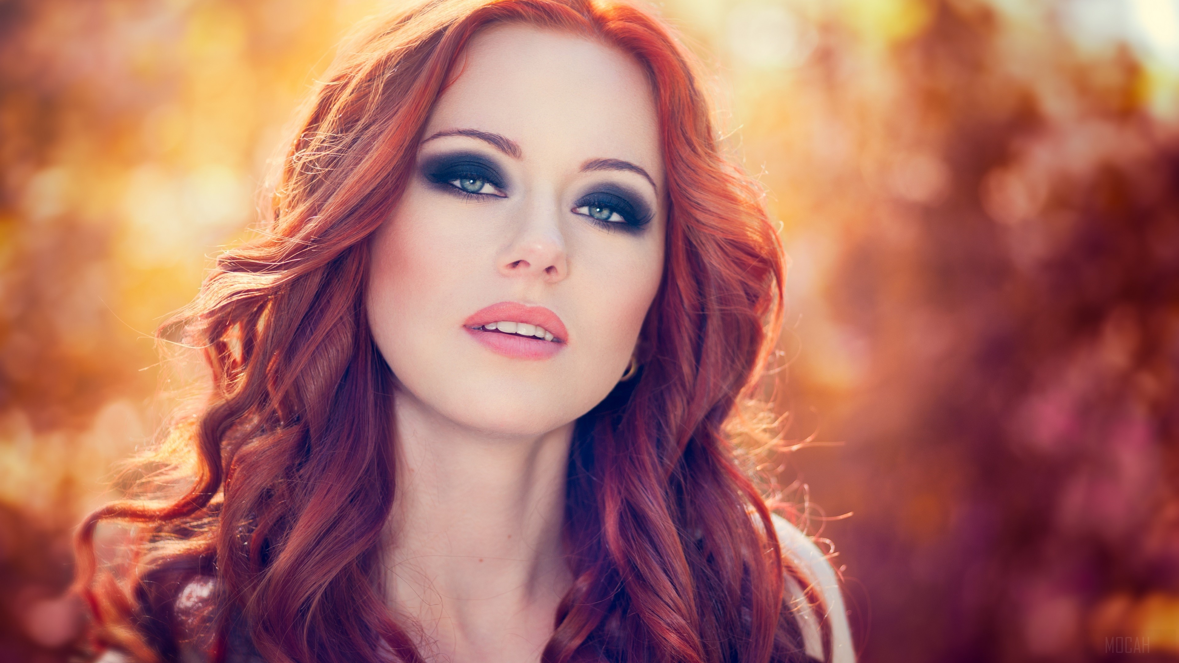 Woman with red hair and dark eye makeup HD Wallpaper