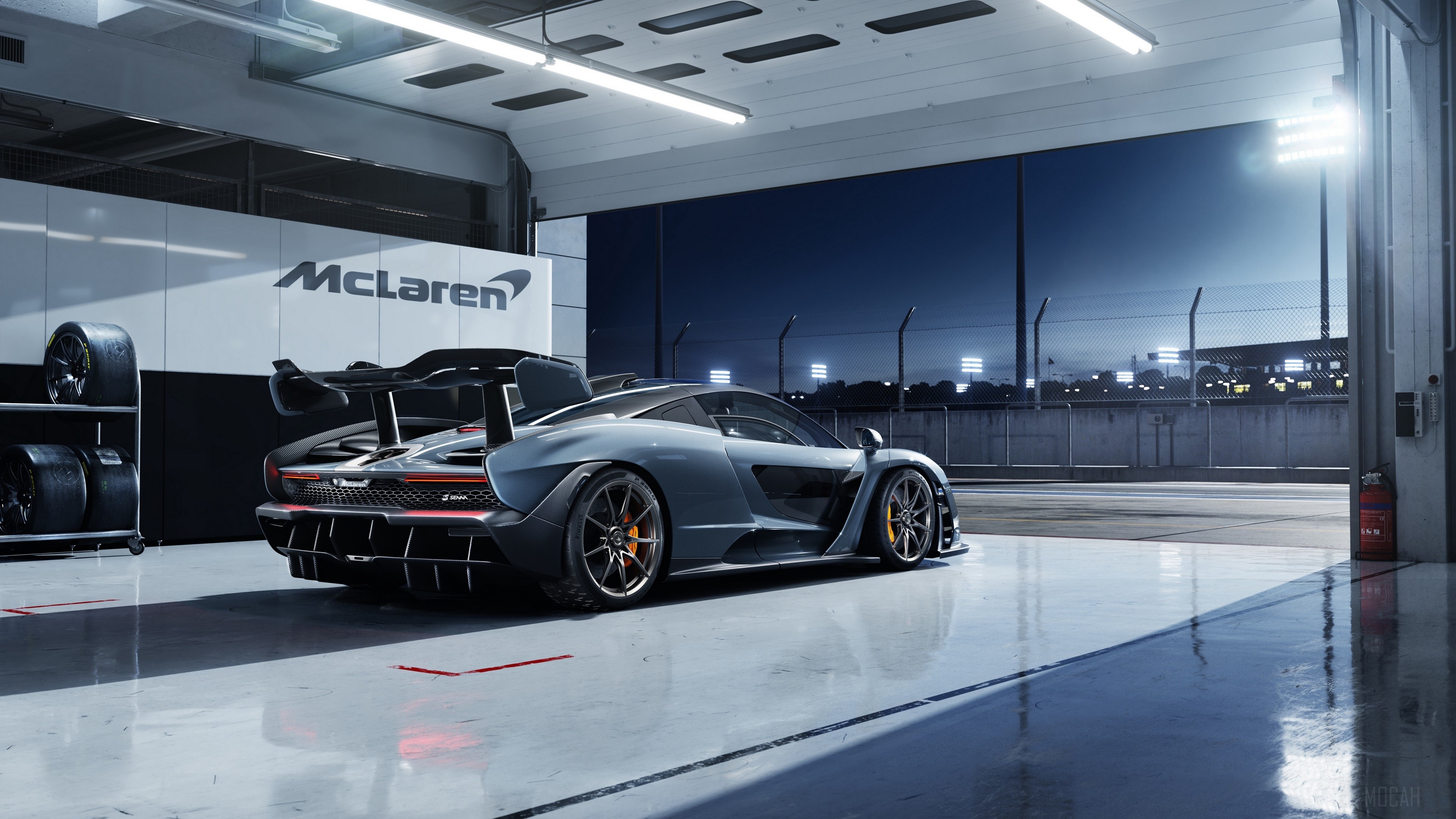 McLaren Senna in a garage with tires HD Wallpaper