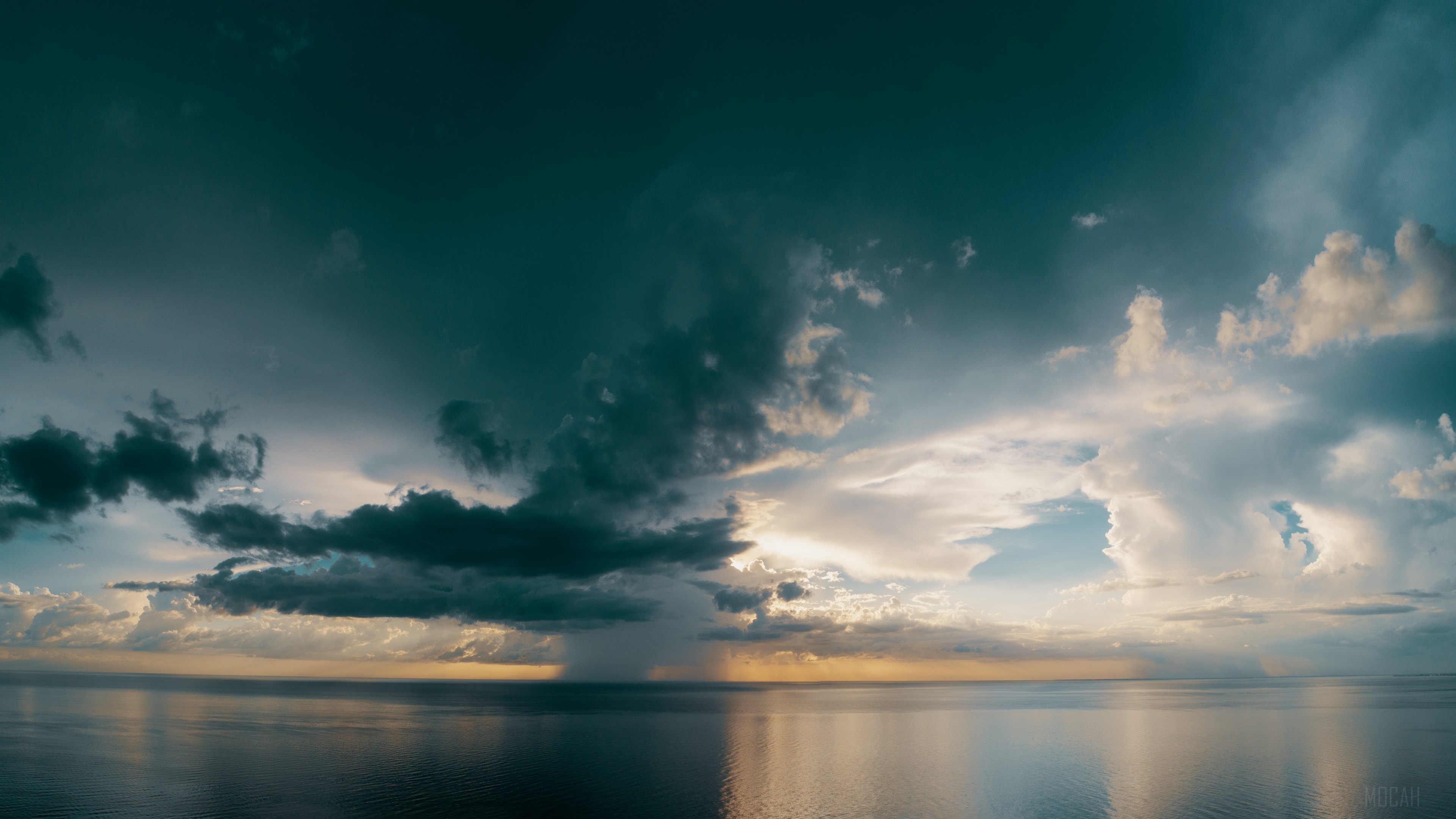 Stormy Clouds Over the Ocean Horizon 4K HD Wallpaper