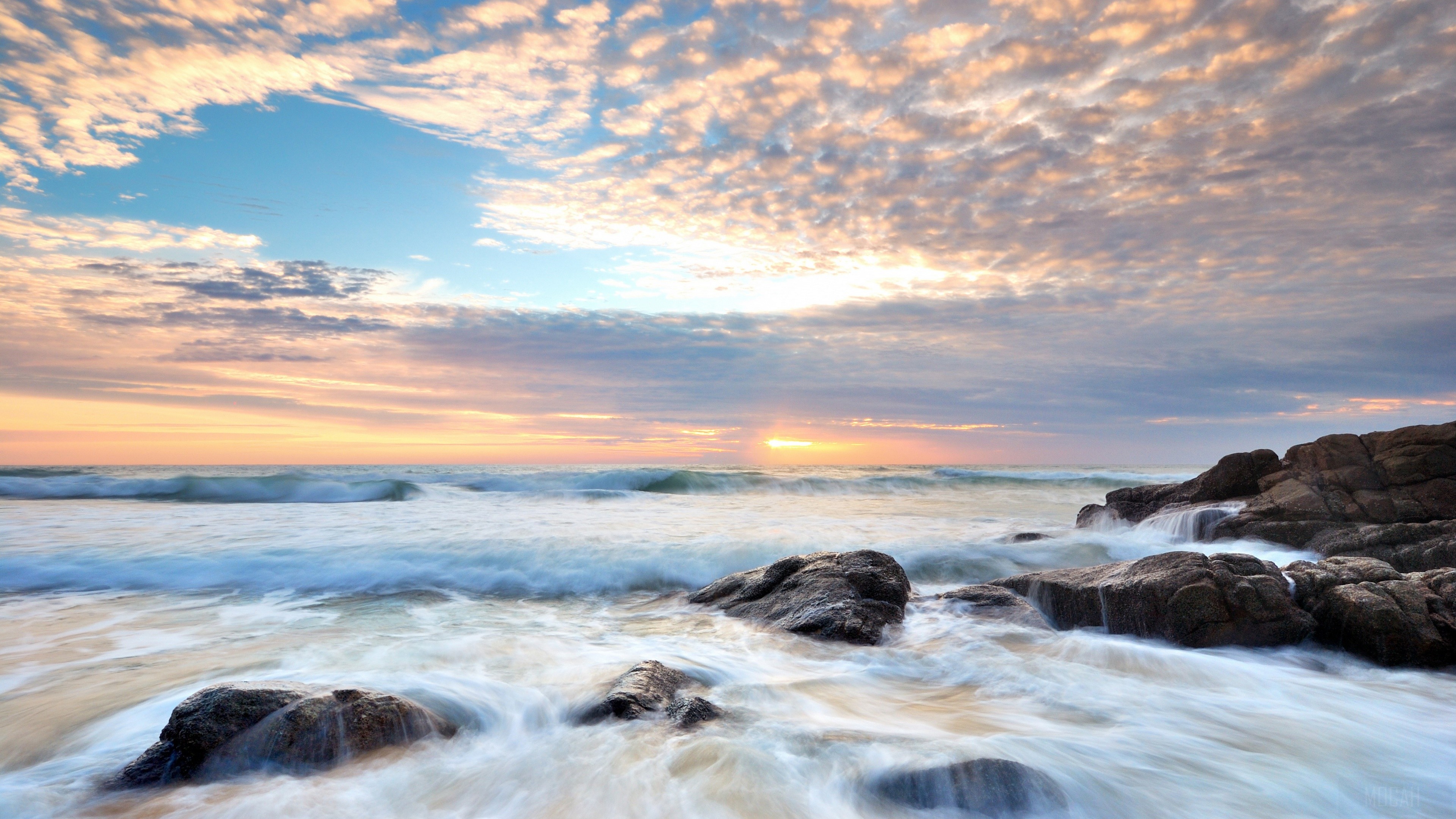 Ocean waves crashing on rocks at sunset 4K HD Wallpaper