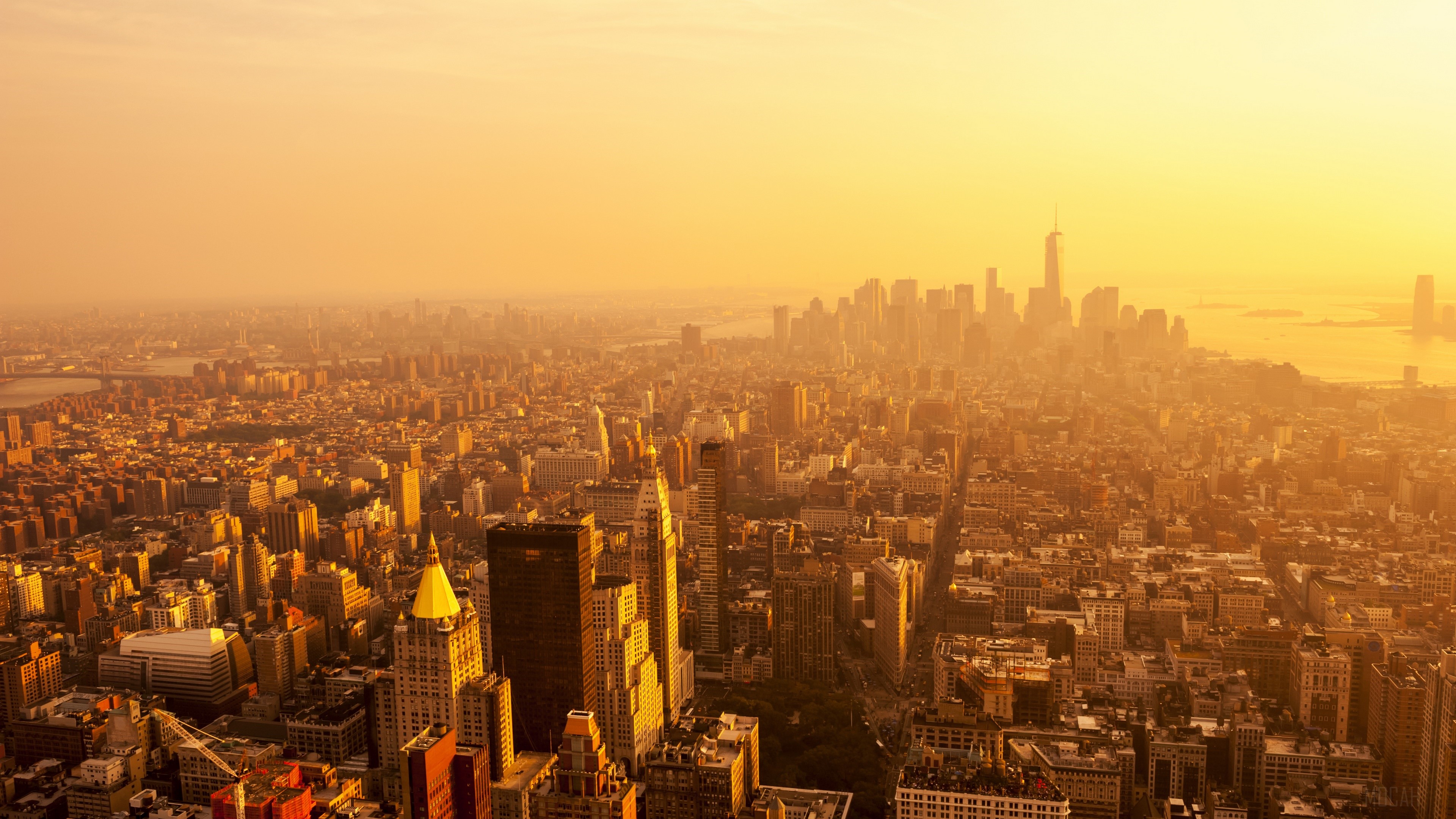 Aerial view of New York City skyline at sunset 4K HD Wallpaper