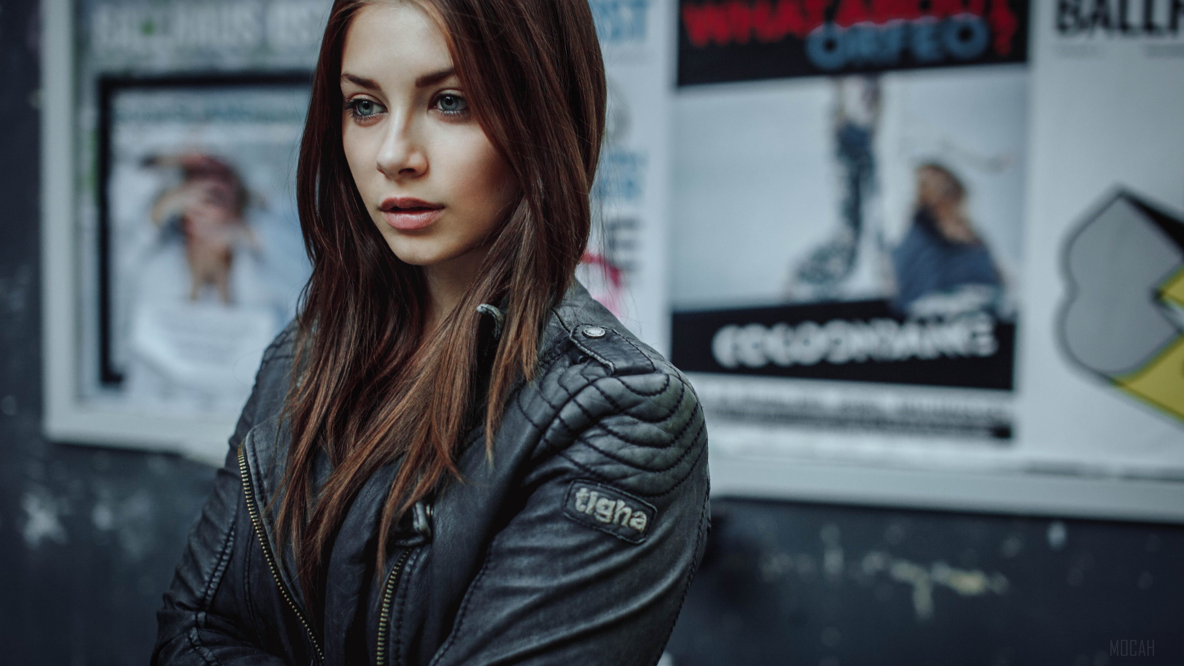 Woman with Blue Eyes and Brunette Hair Wearing Leather Jacket 4K HD Wallpaper