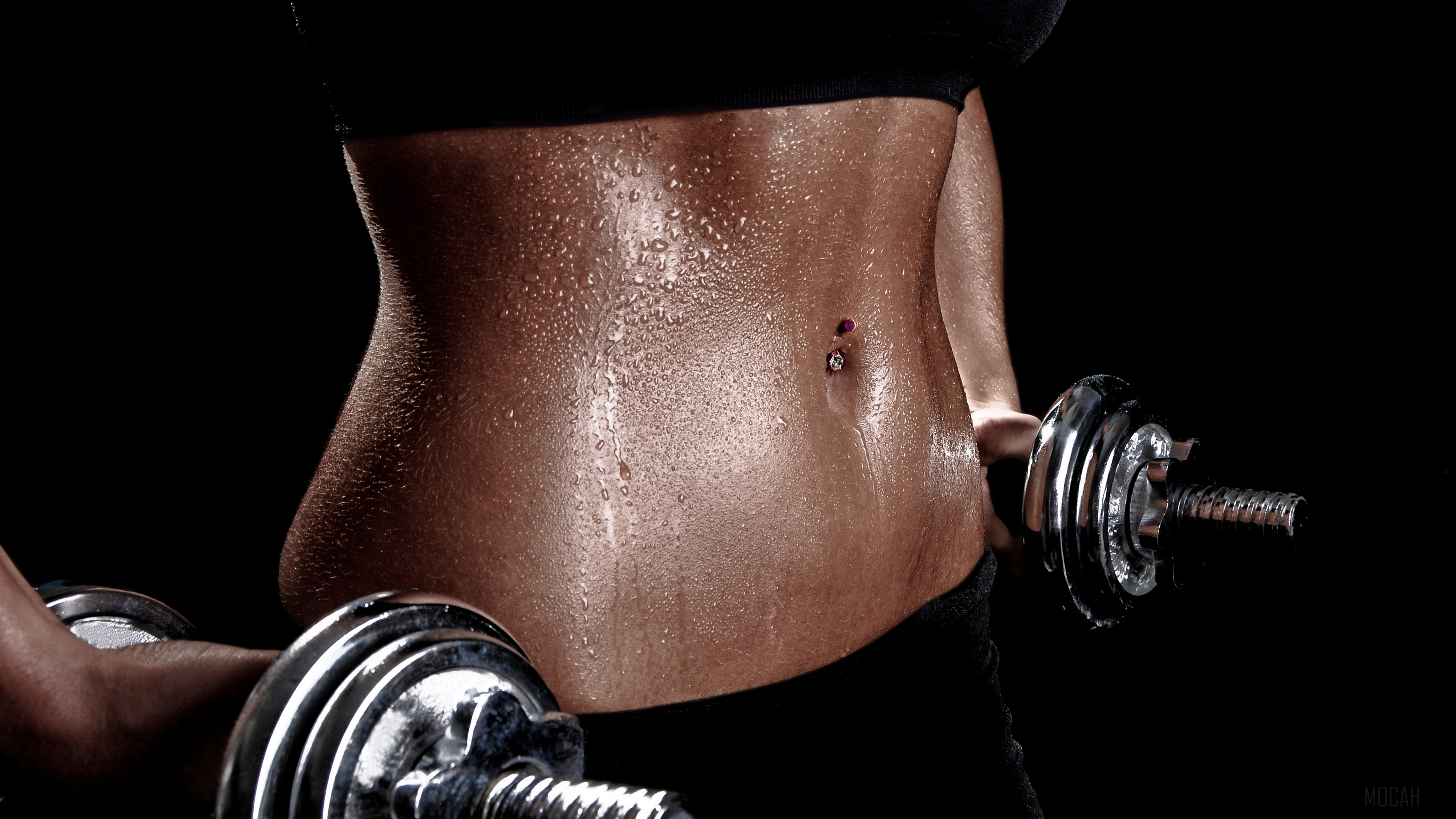 Woman with toned abs holding dumbbells HD Wallpaper